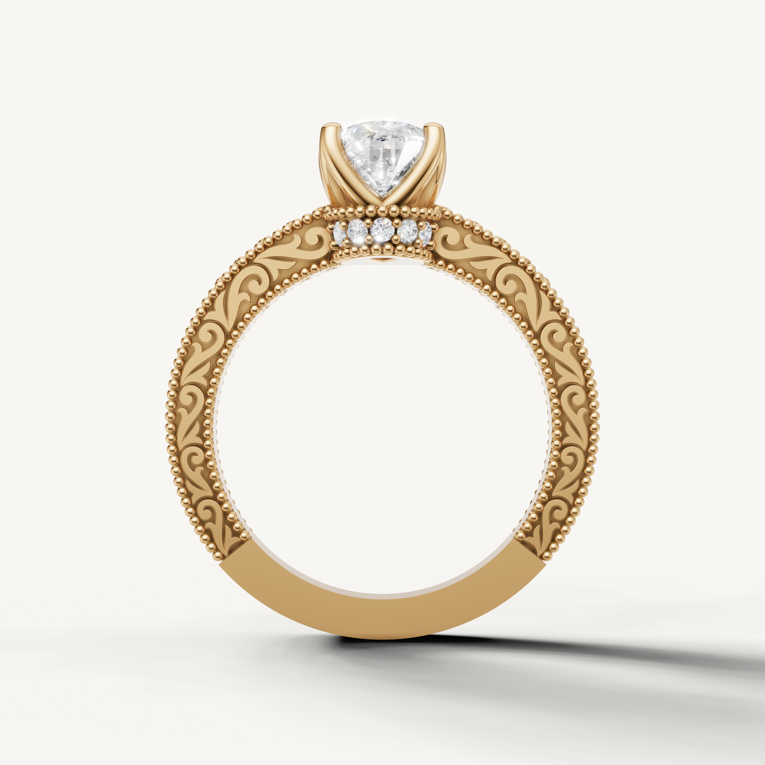 Antique-inspired pear cut lab grown diamond engagement ring in 14K yellow gold with ornate milgrain craftsmanship by Raul Diamonds.