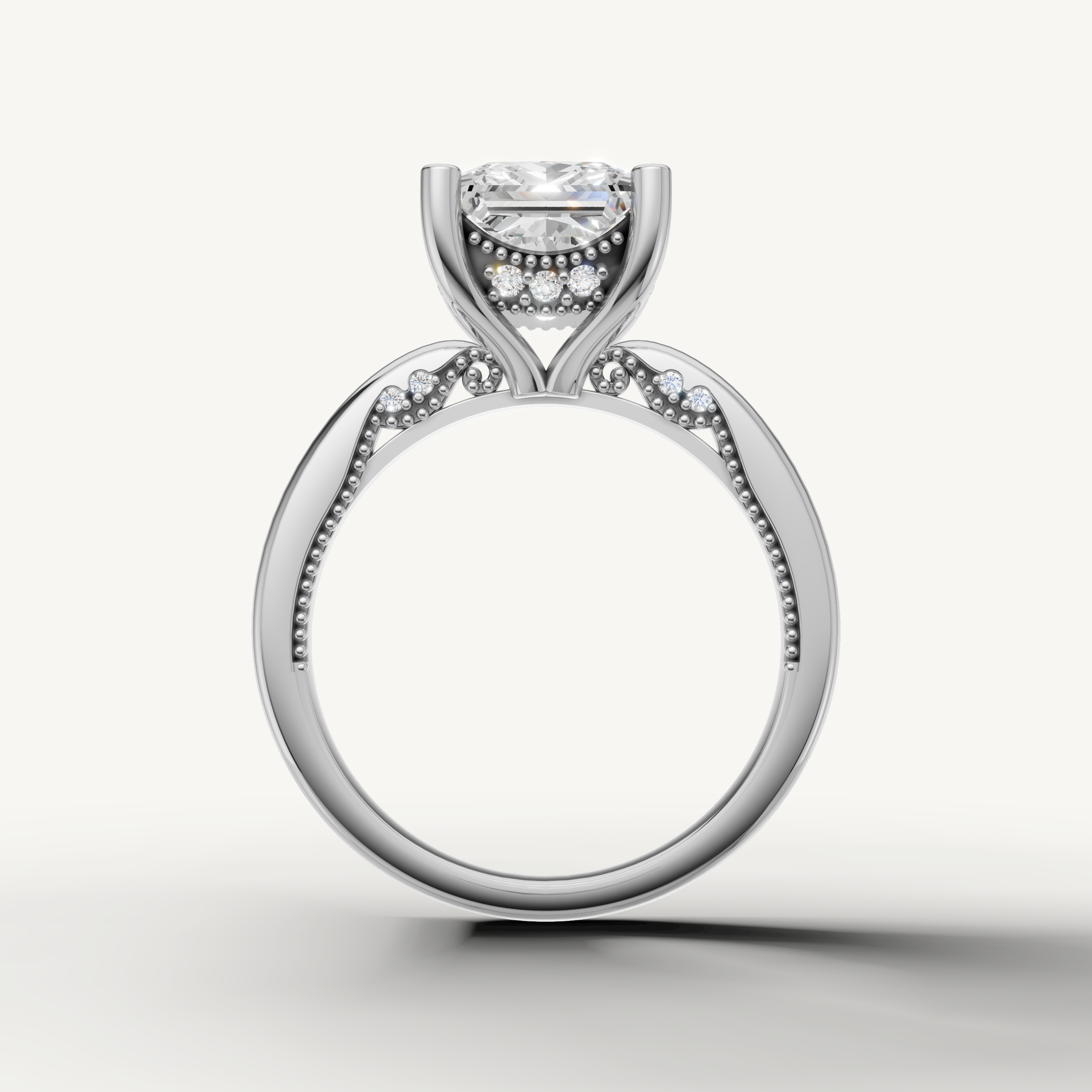 A luxury white gold engagement ring that maximizes the brilliance and fire of a central princess-cut diamond against a cool, bright metal finish.