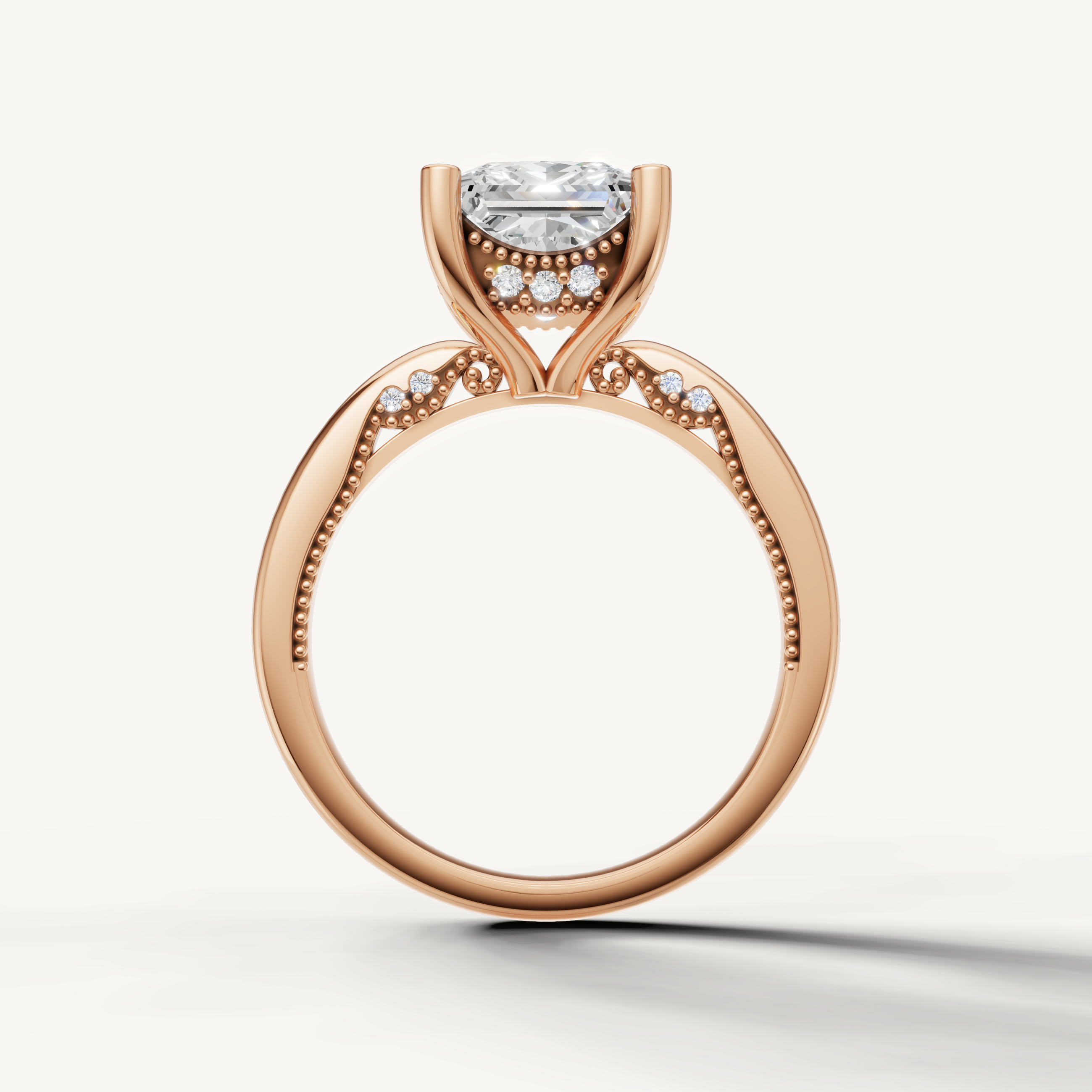A sophisticated rose gold engagement ring that beautifully frames the clarity and sharp geometry of a princess-cut center diamond.
