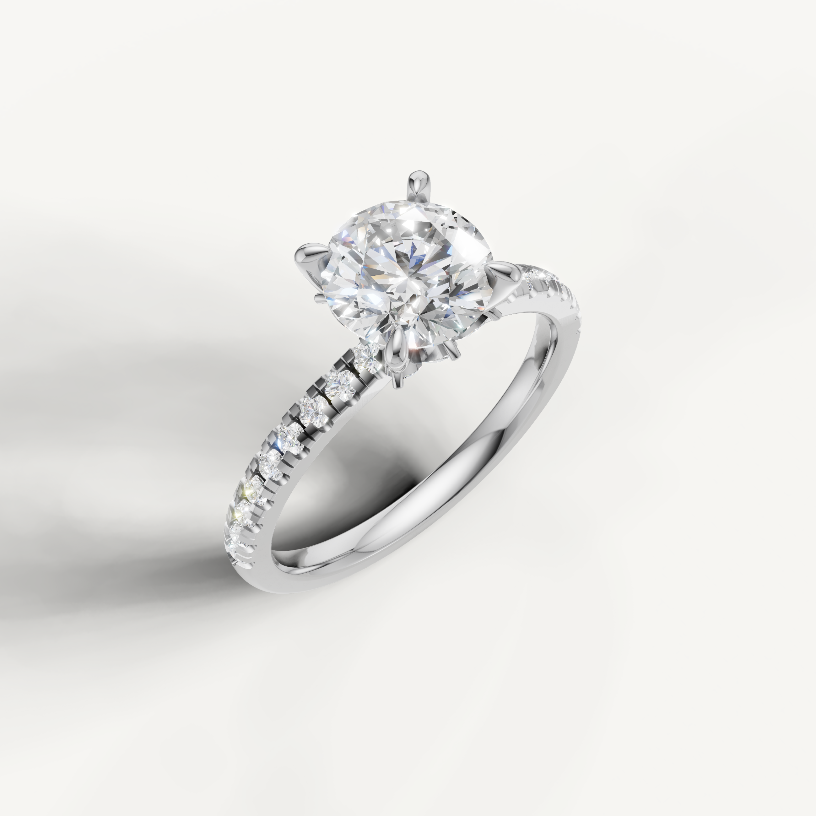 White gold round diamond ring with a hidden halo design, highlighting the signature Raul Diamonds craftsmanship.