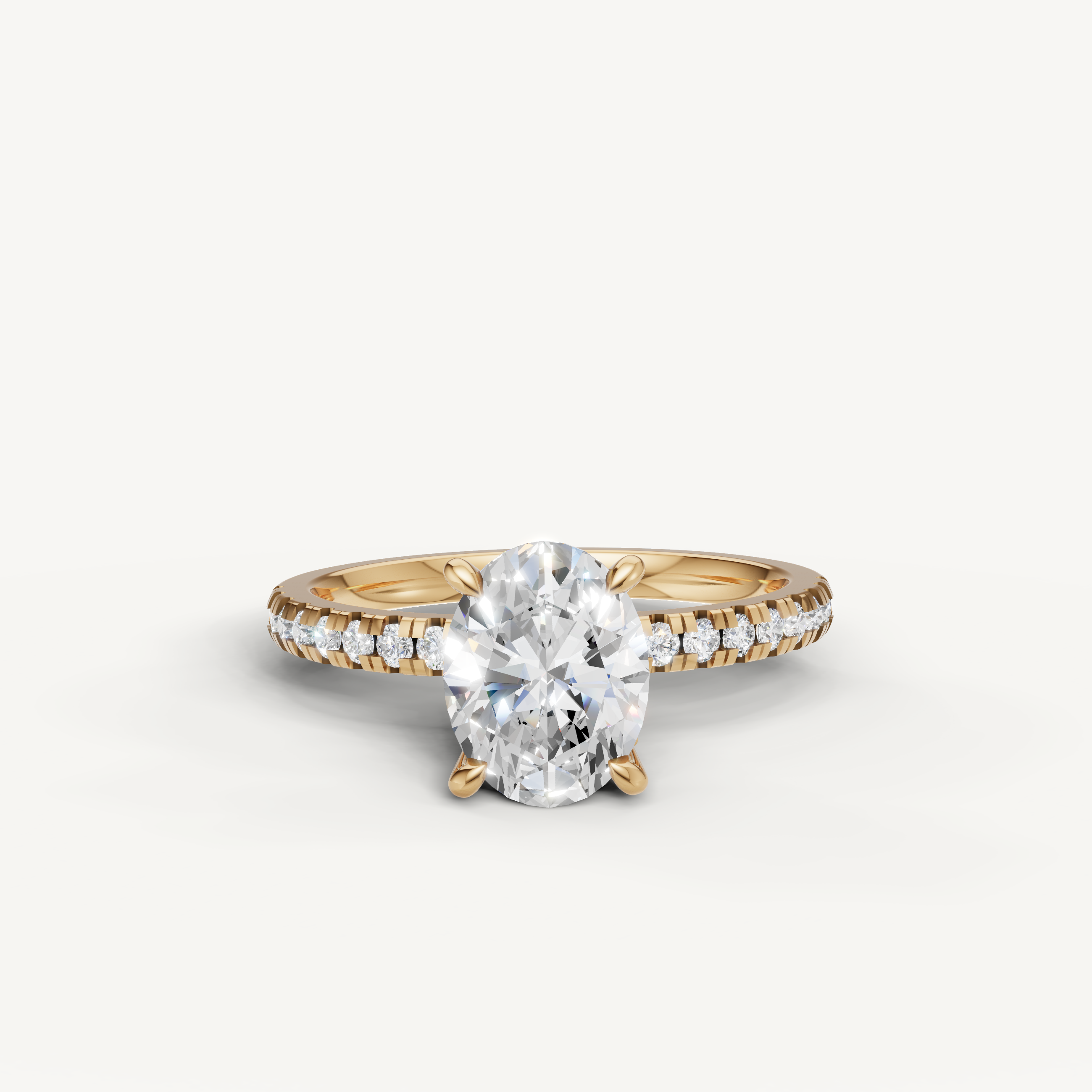Oval cut lab grown diamond engagement ring with pavé band yellow gold 4 prong setting