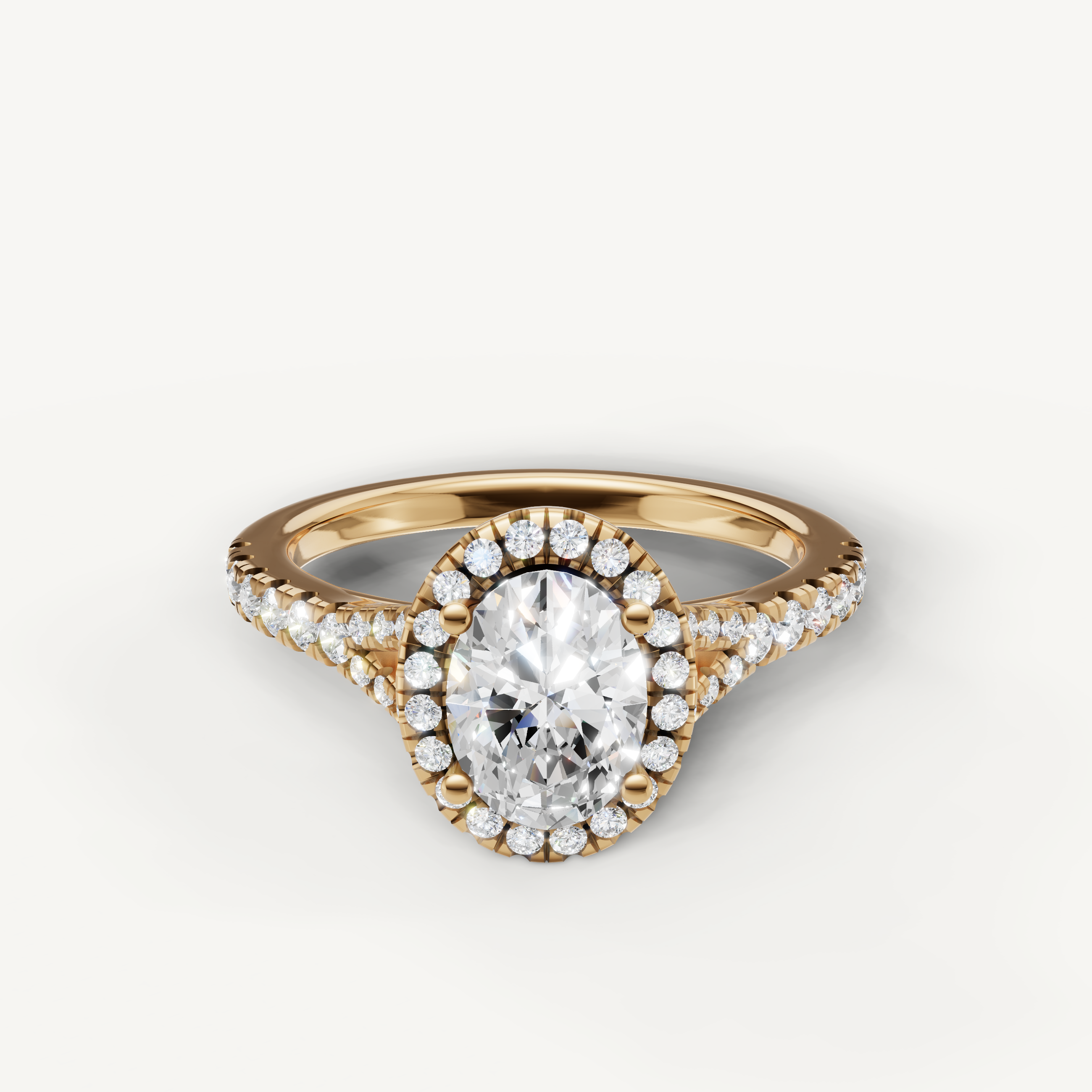 Oval cut halo pavé lab grown diamond engagement ring in 14K yellow gold