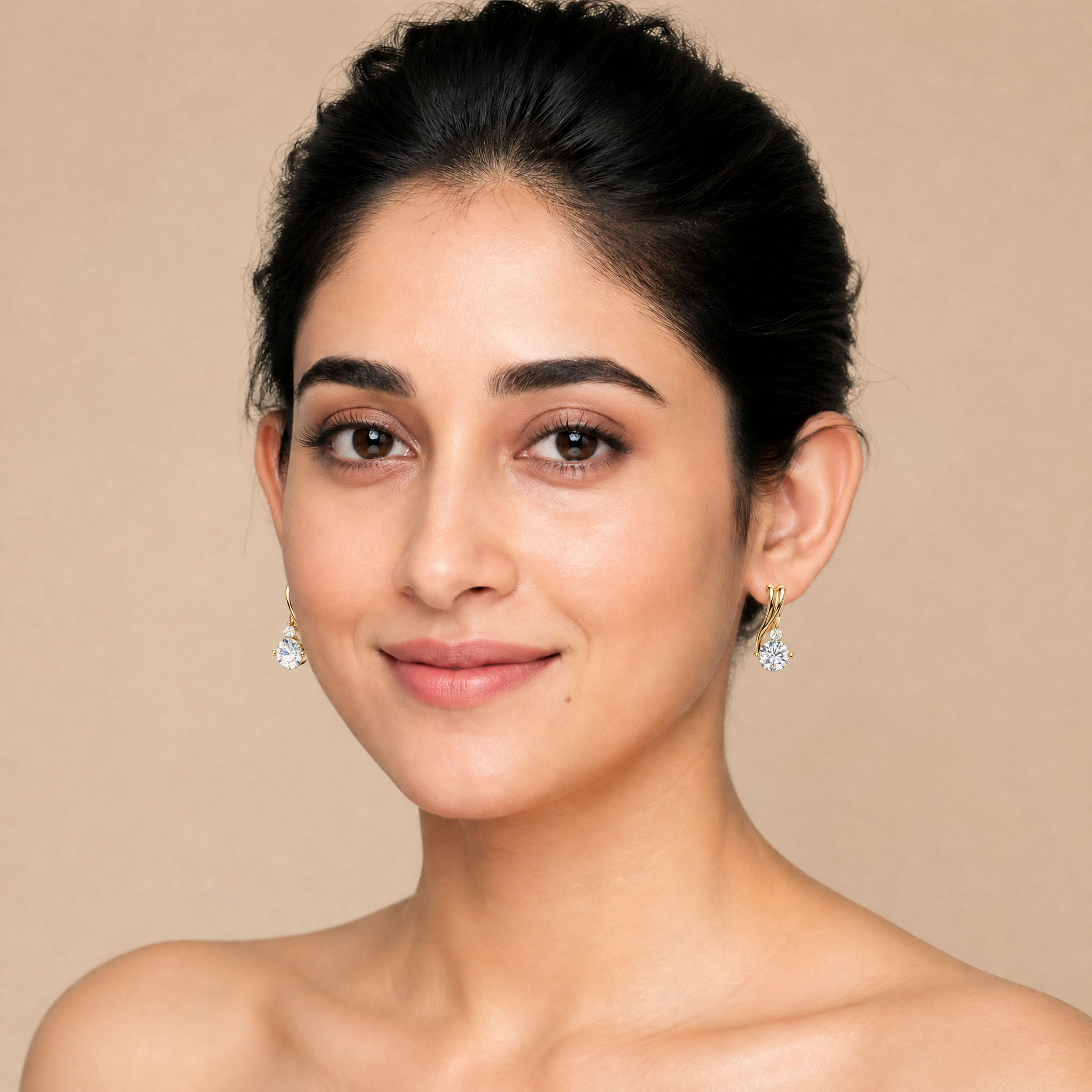 Elegant model wearing Raul Diamonds twisted diamond drop earrings with luxury sparkle