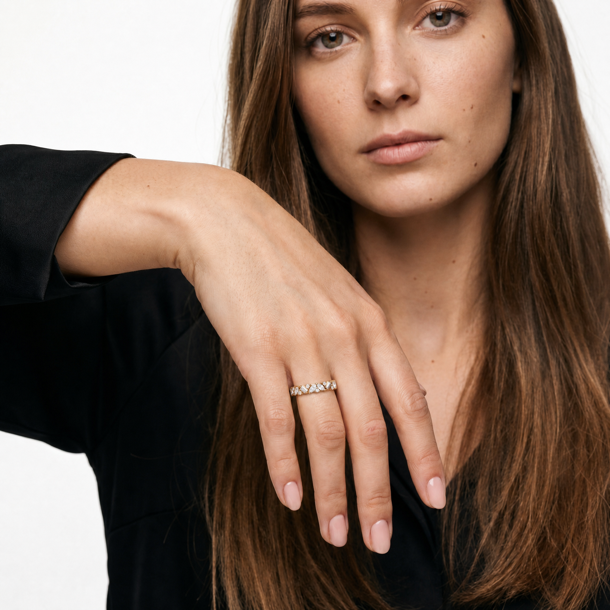 Model Isabella Grace wearing Raul Diamonds yellow gold mixed diamond wedding band with baguette and marquise stones