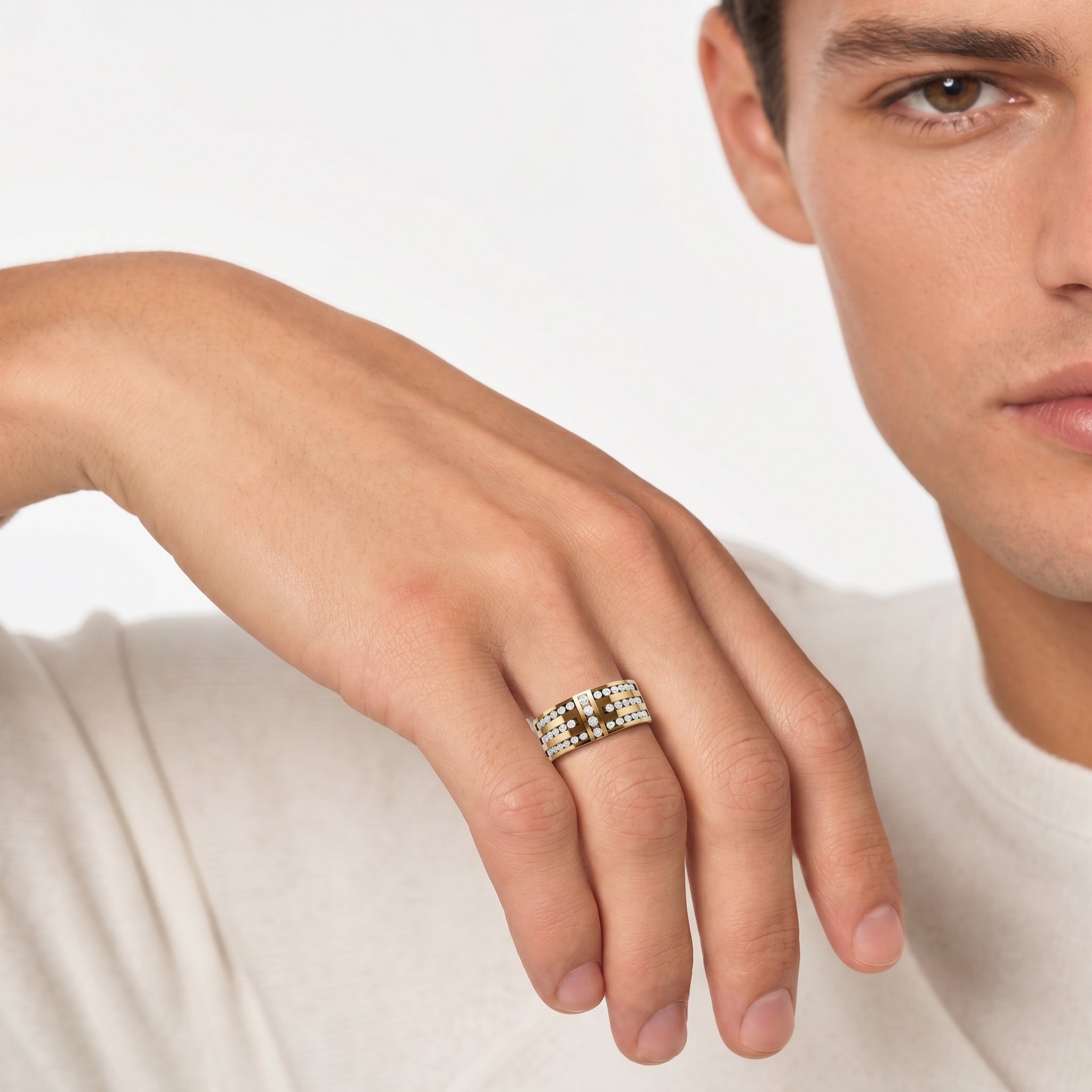 Male model wearing Raul Diamonds yellow gold triple row diamond wedding band with luxury modern styling