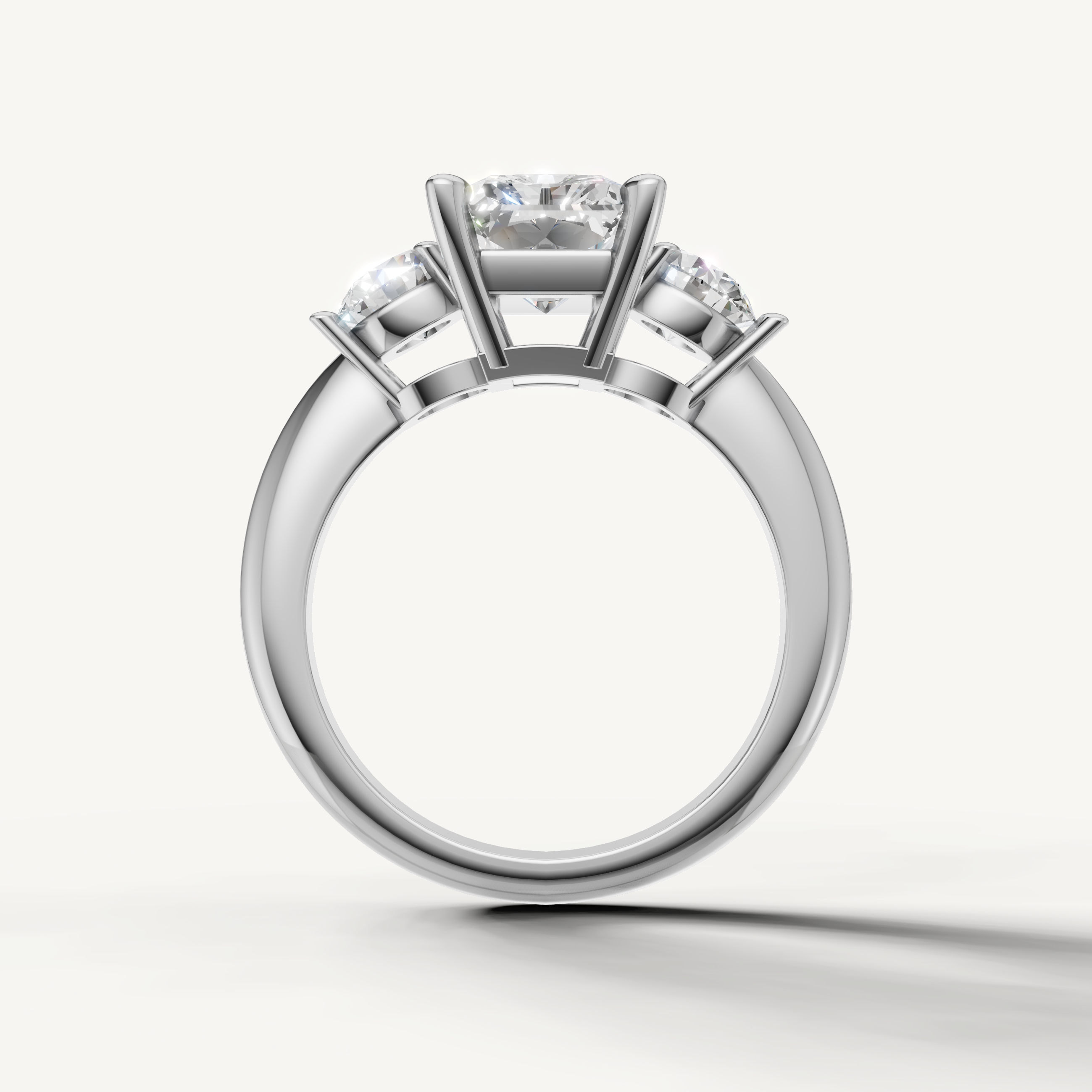 Classic radiant diamond engagement ring with round side stones white gold