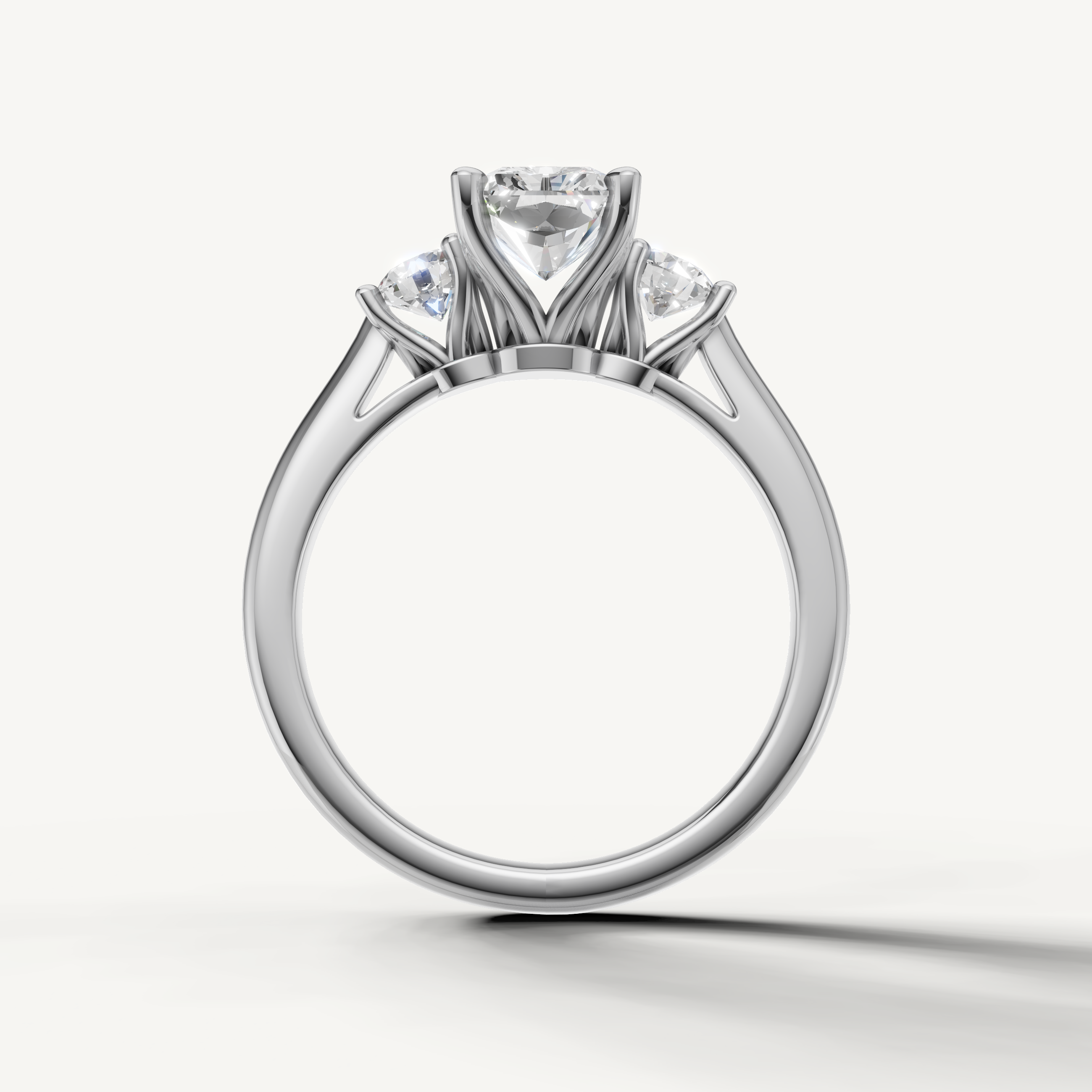 Classic radiant diamond engagement ring with round side stones in white gold