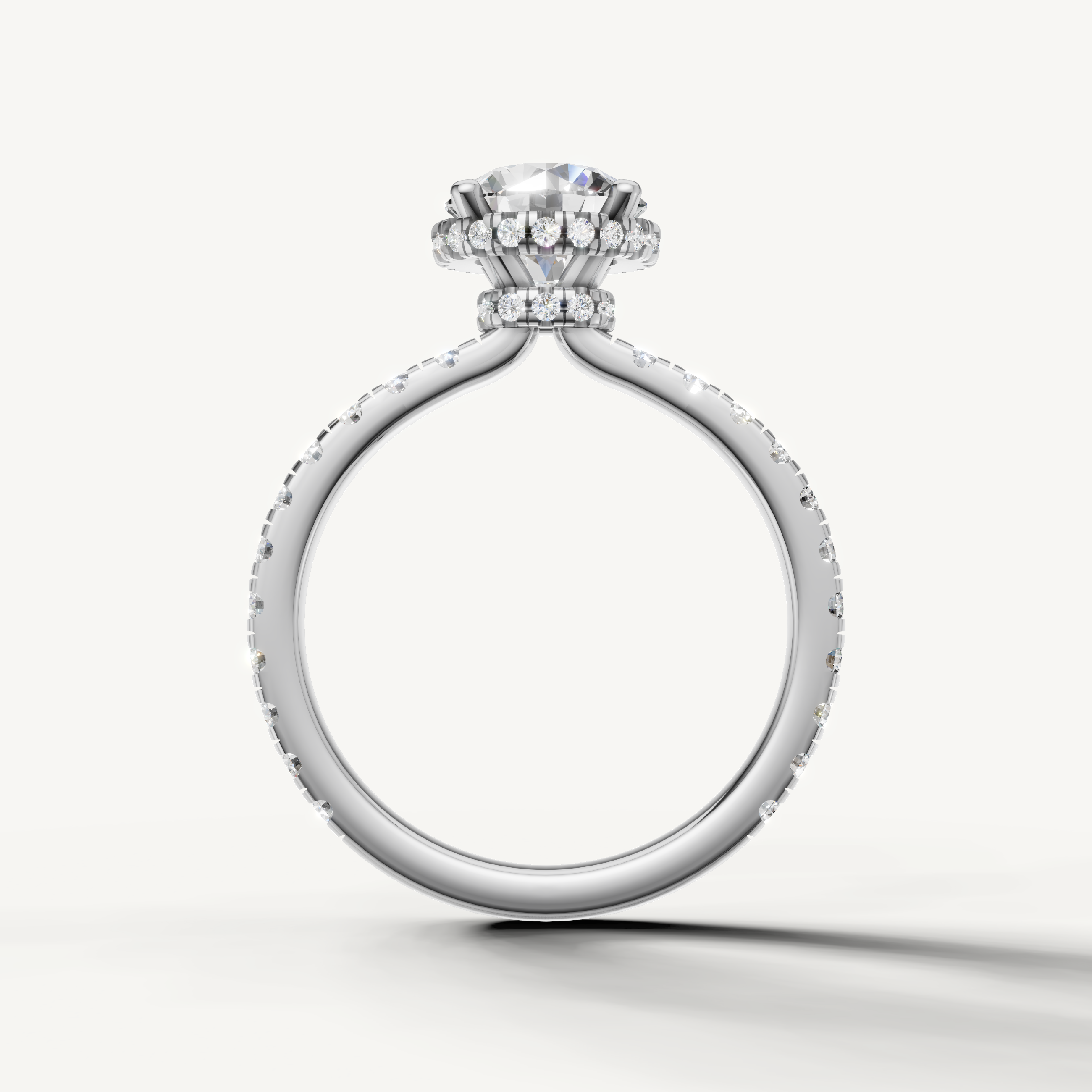 modern round cut lab grown diamond hidden halo engagement ring in 14k white gold with timeless pavé diamonds