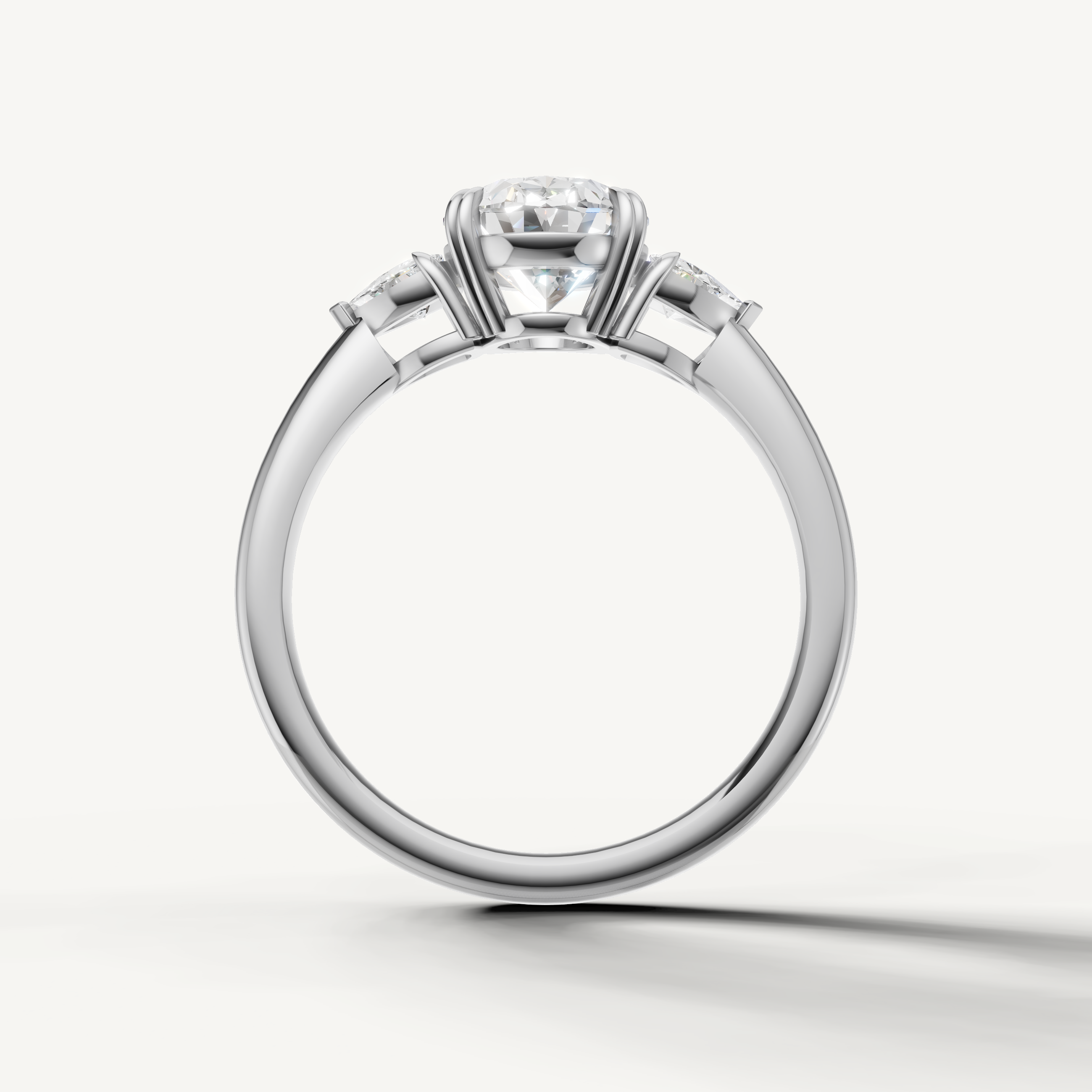 timeless oval lab grown diamond ring with tapered trillion side accents
