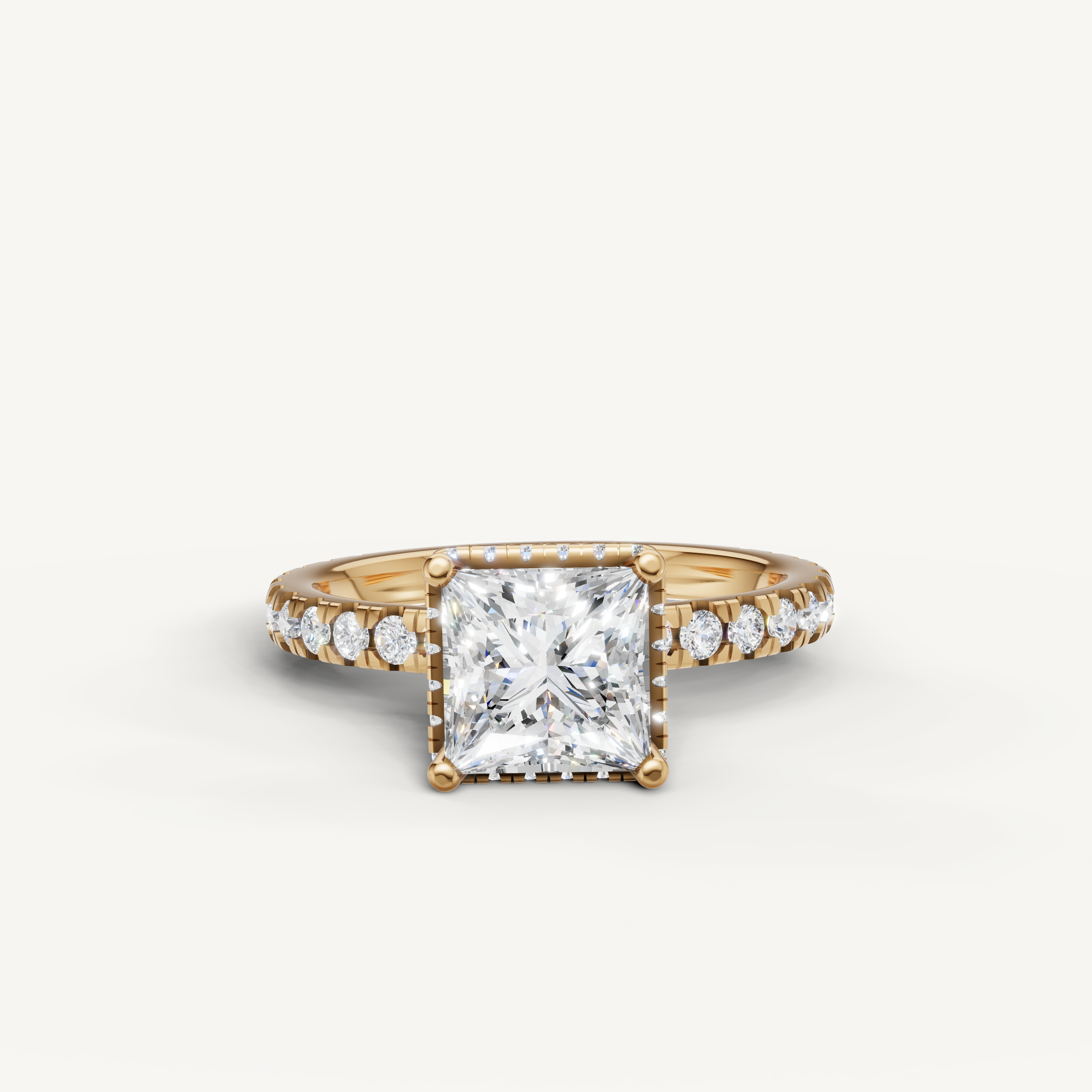 princess cut lab grown diamond hidden halo engagement ring in 14k yellow gold with pavé diamond band and radiant sparkle