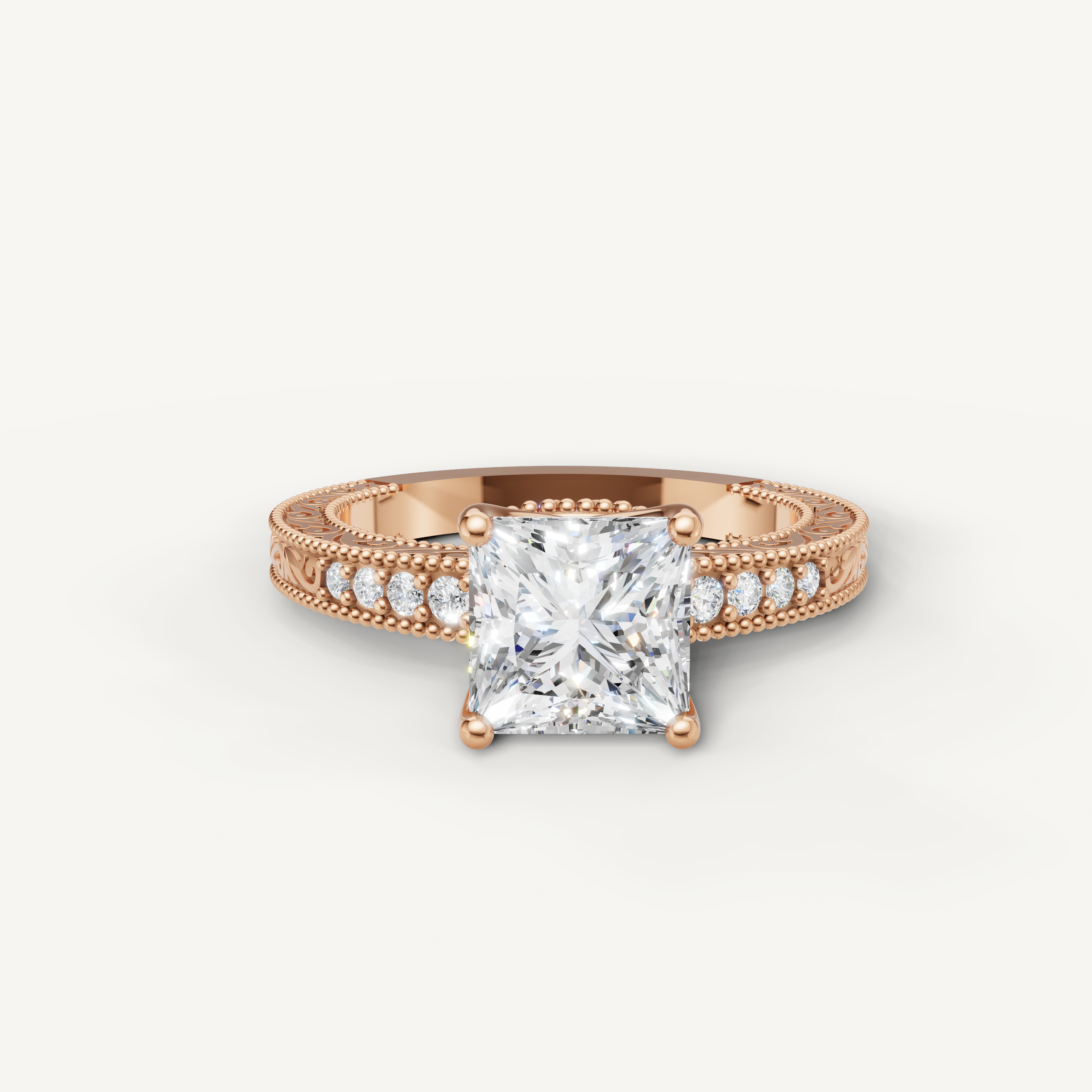 Vintage princess cut lab grown diamond engagement ring in 14K rose gold with detailed milgrain and pavé accents by Raul Diamonds.