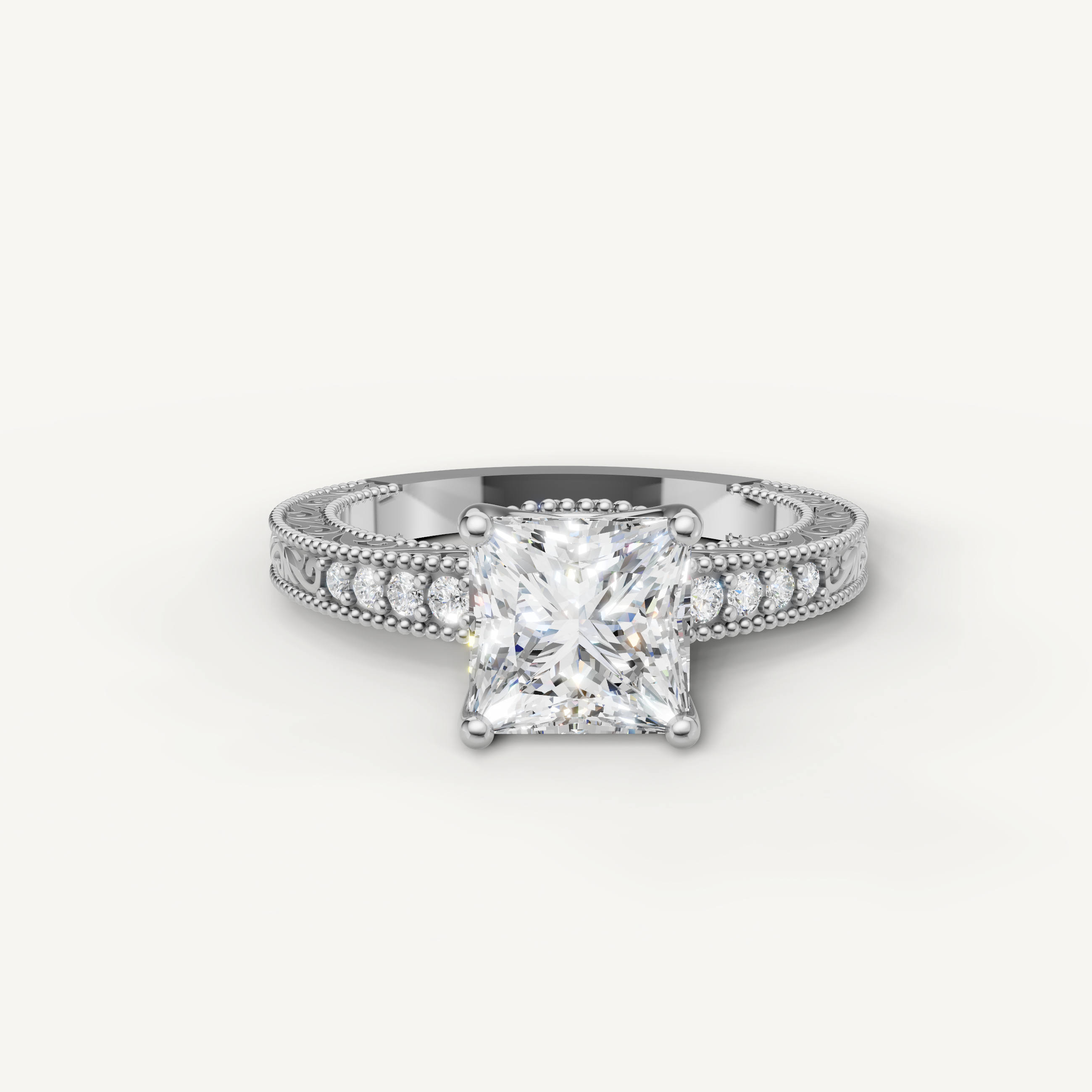Vintage princess cut lab grown diamond engagement ring in 14K white gold with ornate filigree and pavé accents by Raul Diamonds.