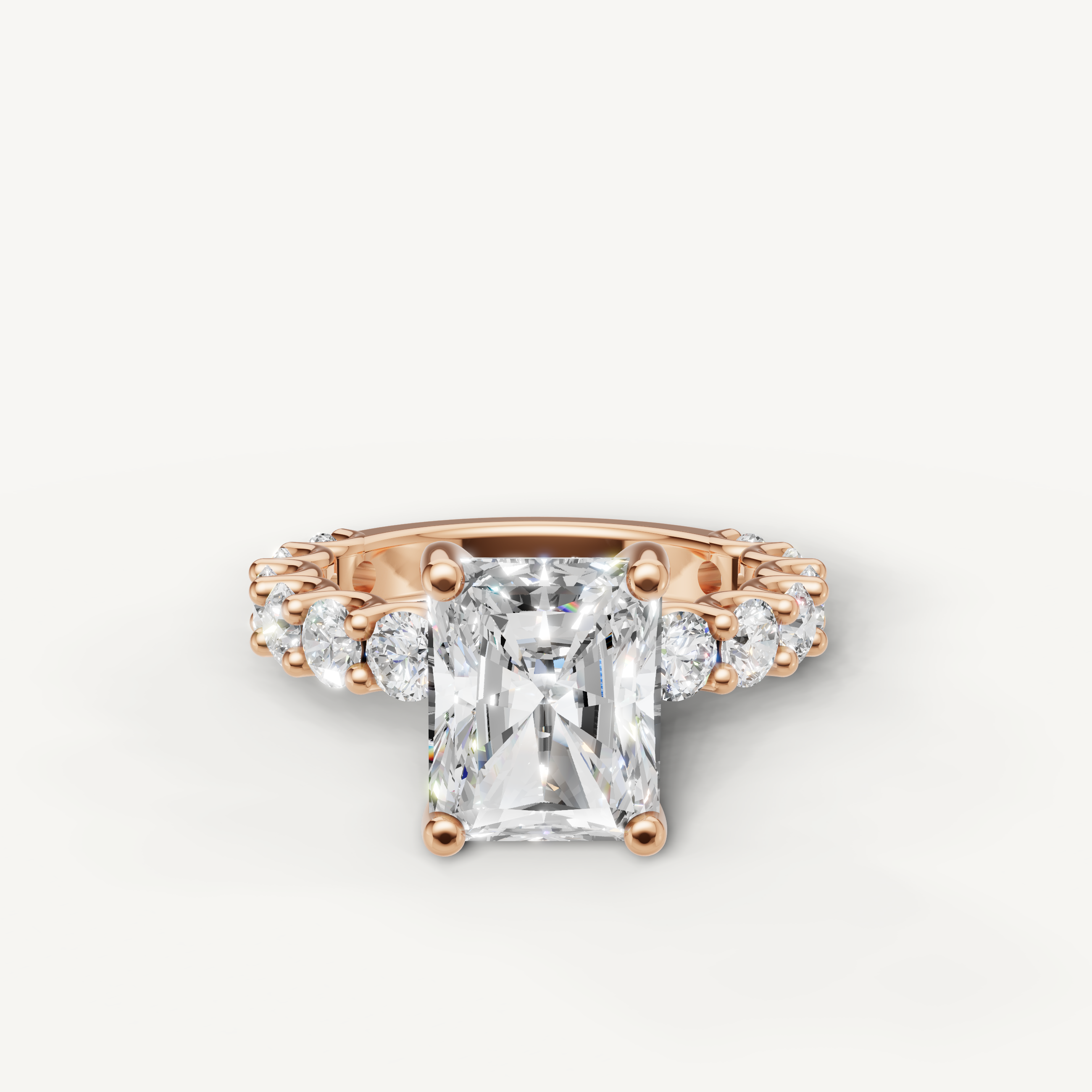 Radiant cut lab grown diamond engagement ring side view with shared prong eternity band in rose gold