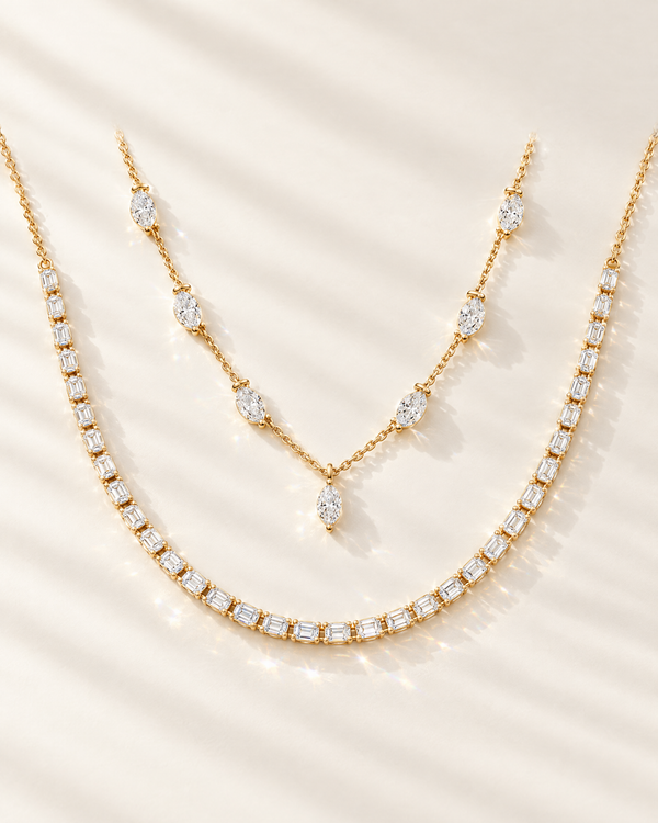 Lab-grown diamond tennis necklace and station necklace in yellow gold