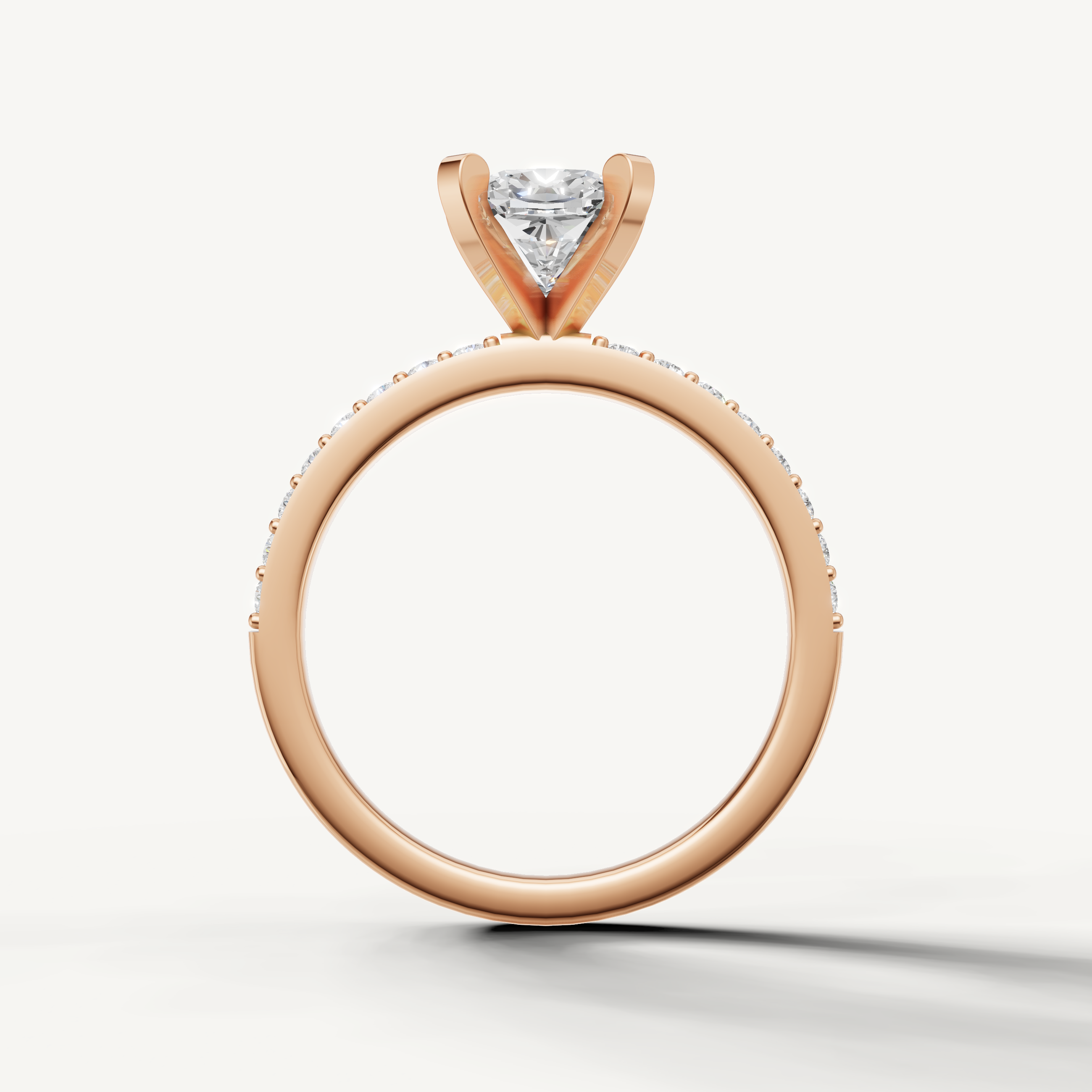 Elegant cushion cut lab grown diamond ring in rose gold pavé setting
