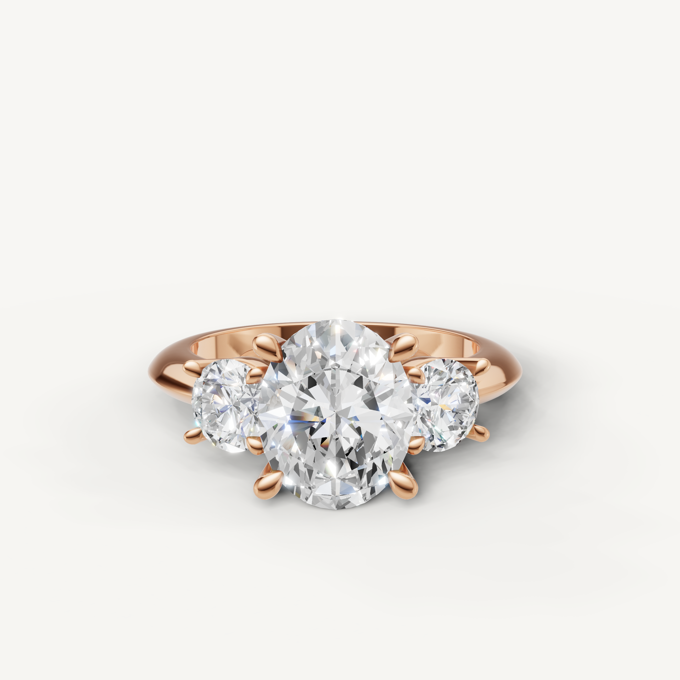 Oval cut three stone lab grown diamond engagement ring in 14K rose gold