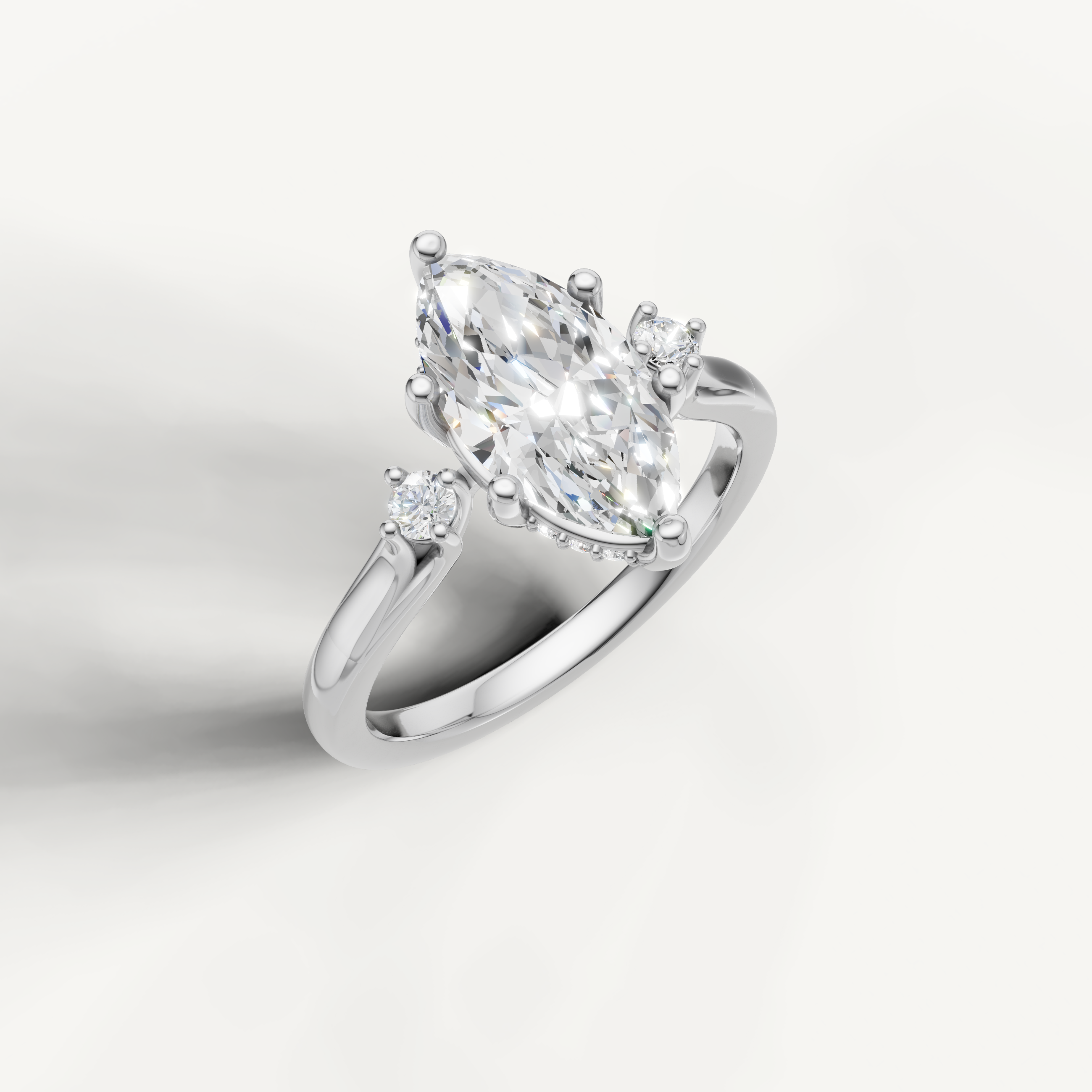 White gold marquise cut diamond ring with elongated center stone by Raul Diamonds