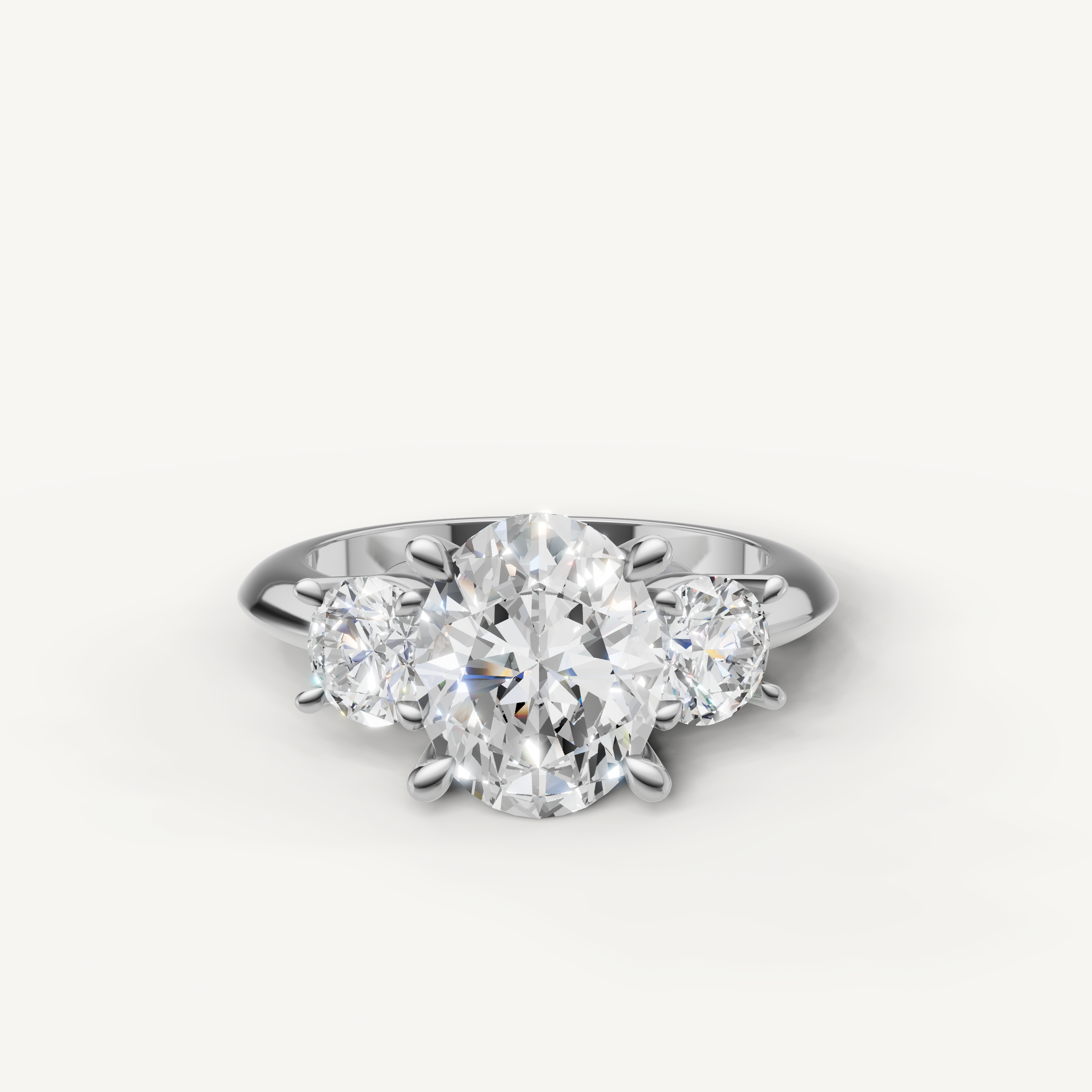 Oval cut three stone lab grown diamond engagement ring in 14K white gold