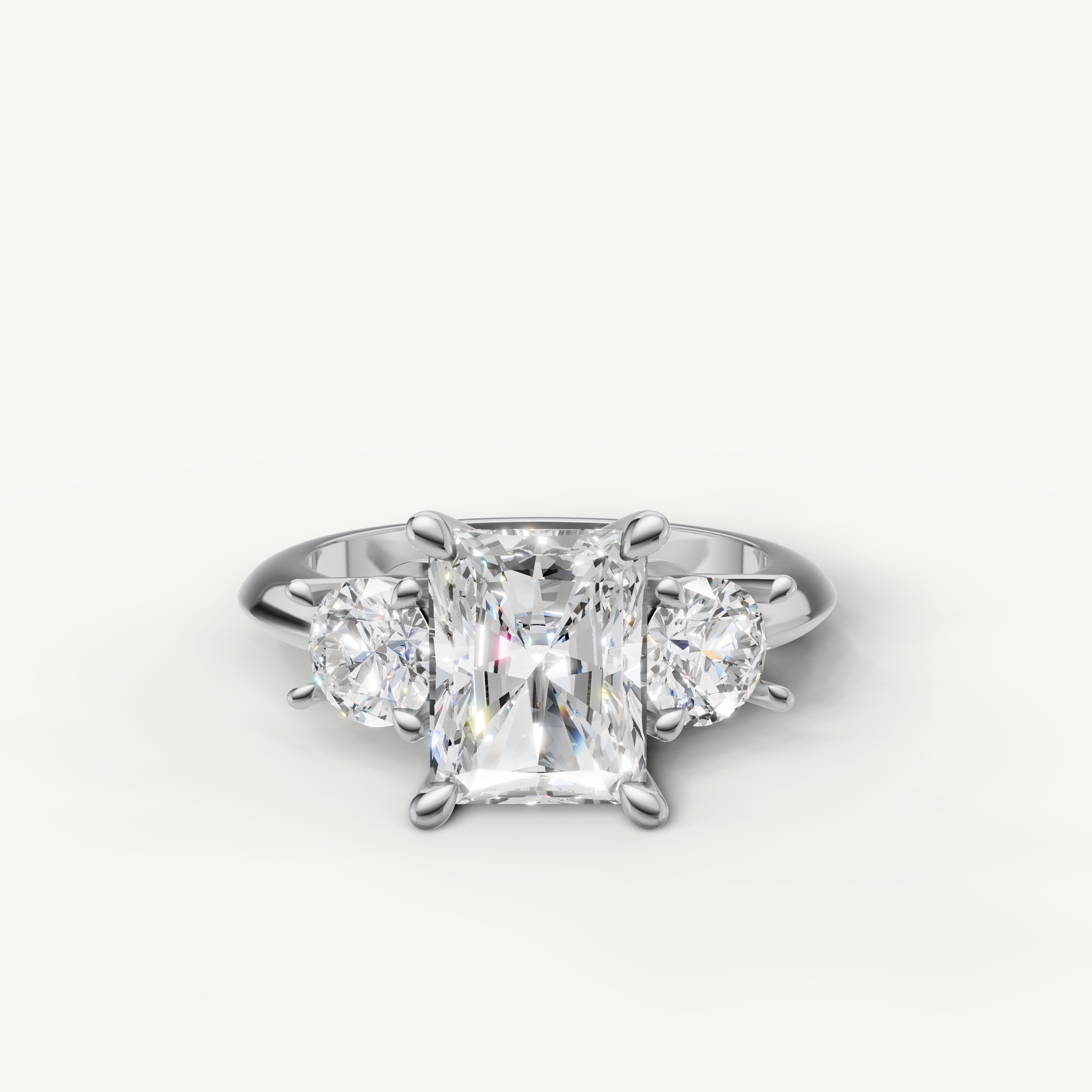 Radiant cut three stone lab grown diamond engagement ring in 14K white gold