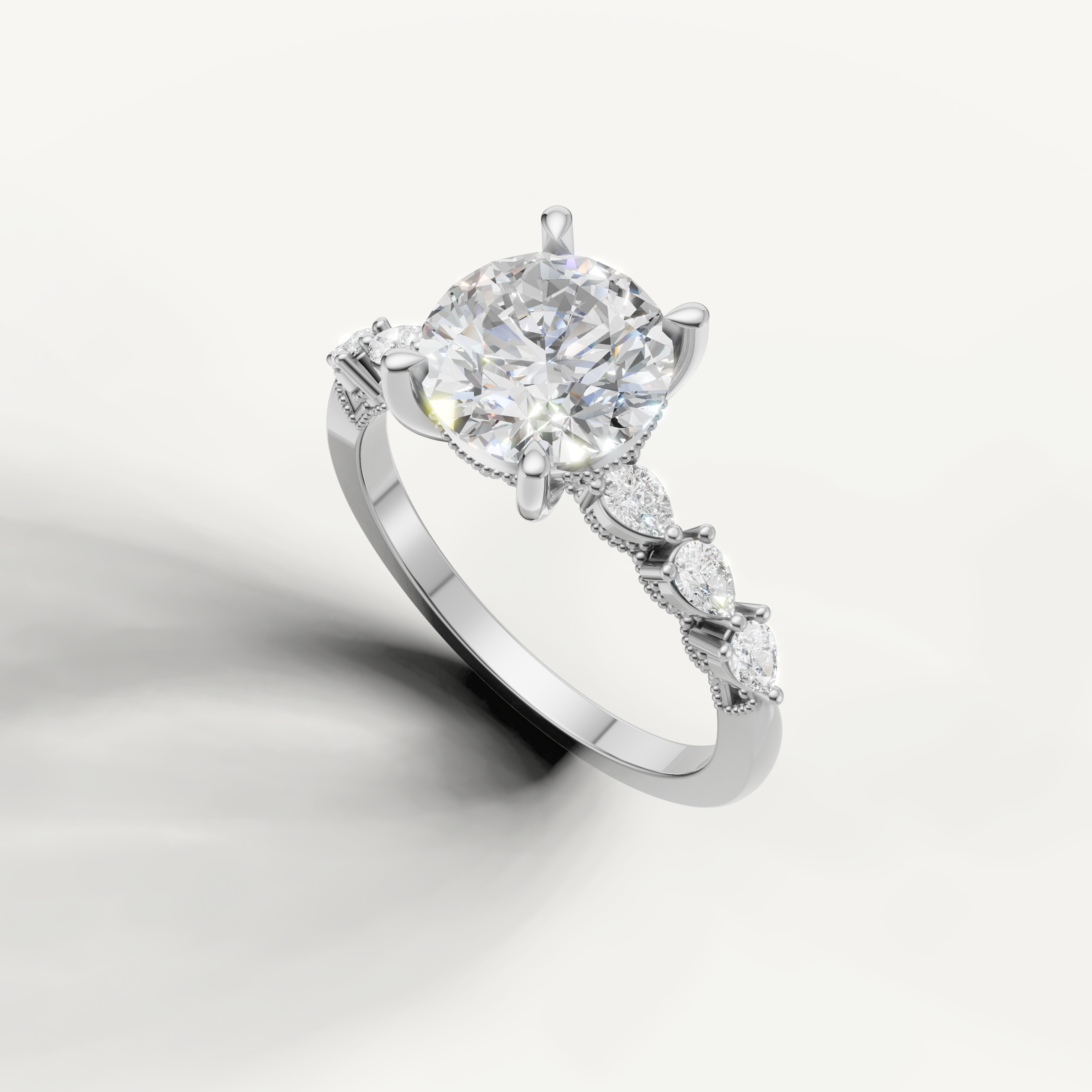 14K white gold round cut engagement ring featuring lab grown diamond center stone and marquise side diamonds