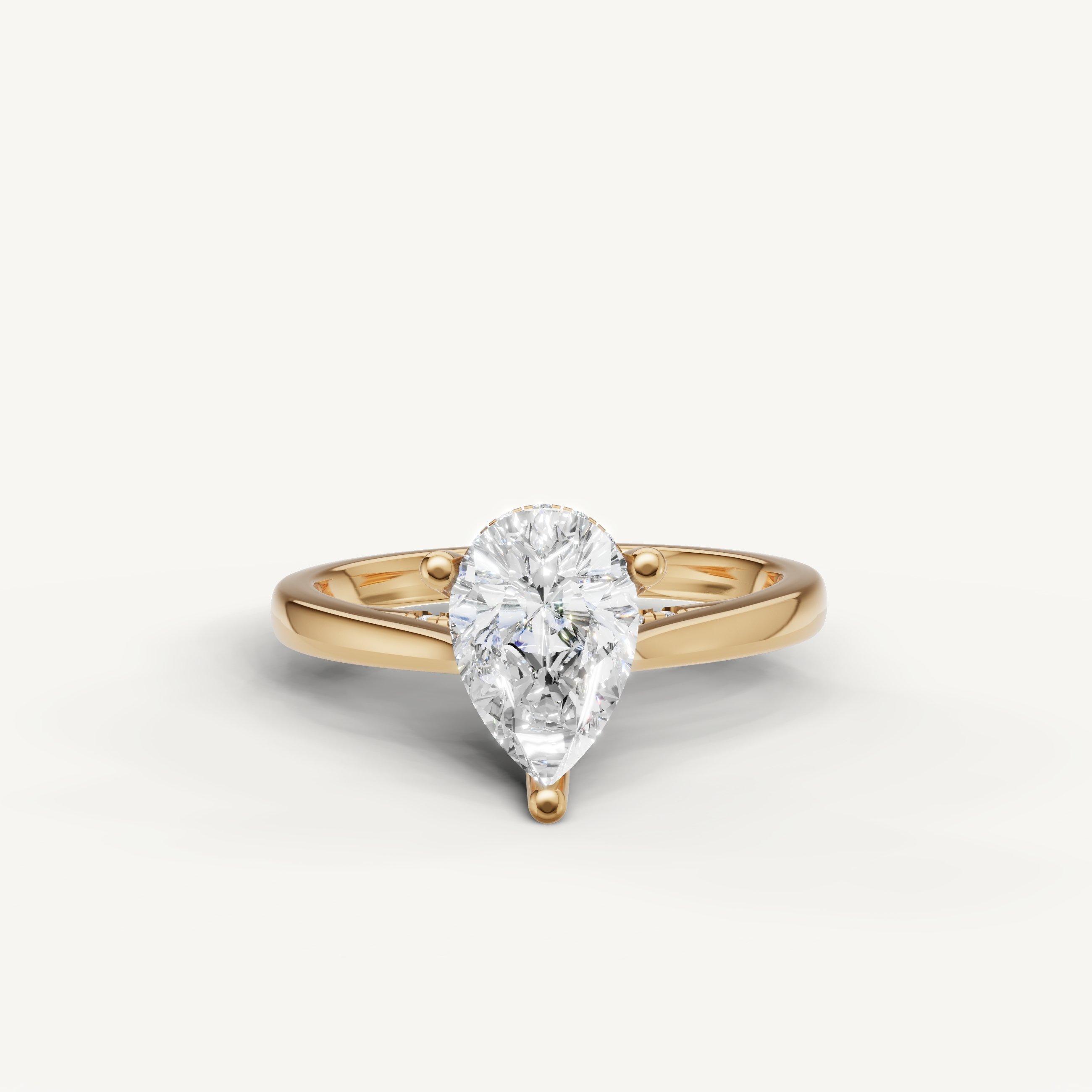 14K yellow gold pear-shaped lab-grown diamond engagement ring with hidden halo by Raul Diamonds
