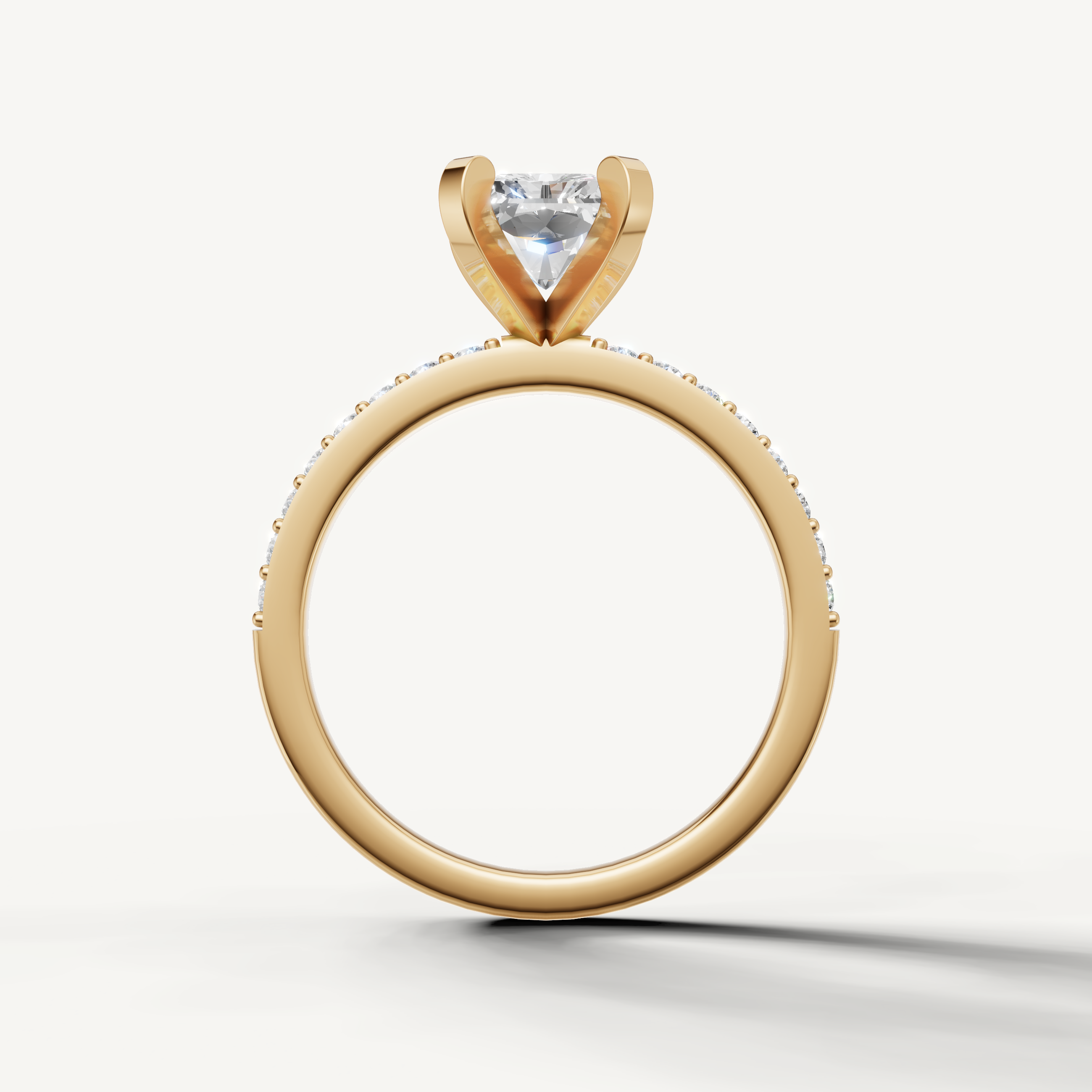 Elegant radiant cut diamond ring in yellow gold slim pavé engagement setting