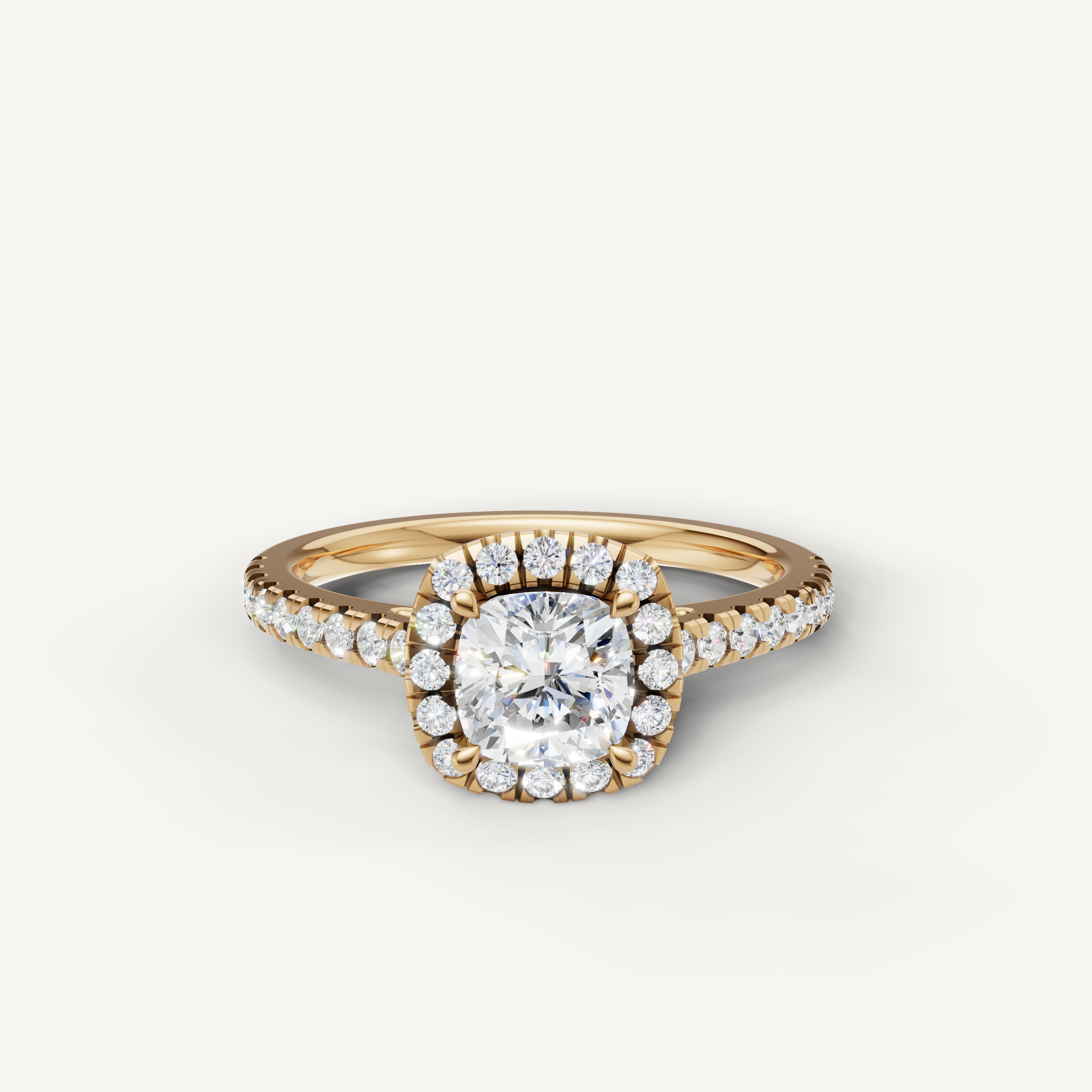 cushion cut lab grown diamond halo engagement ring with pavé band in 14k yellow gold