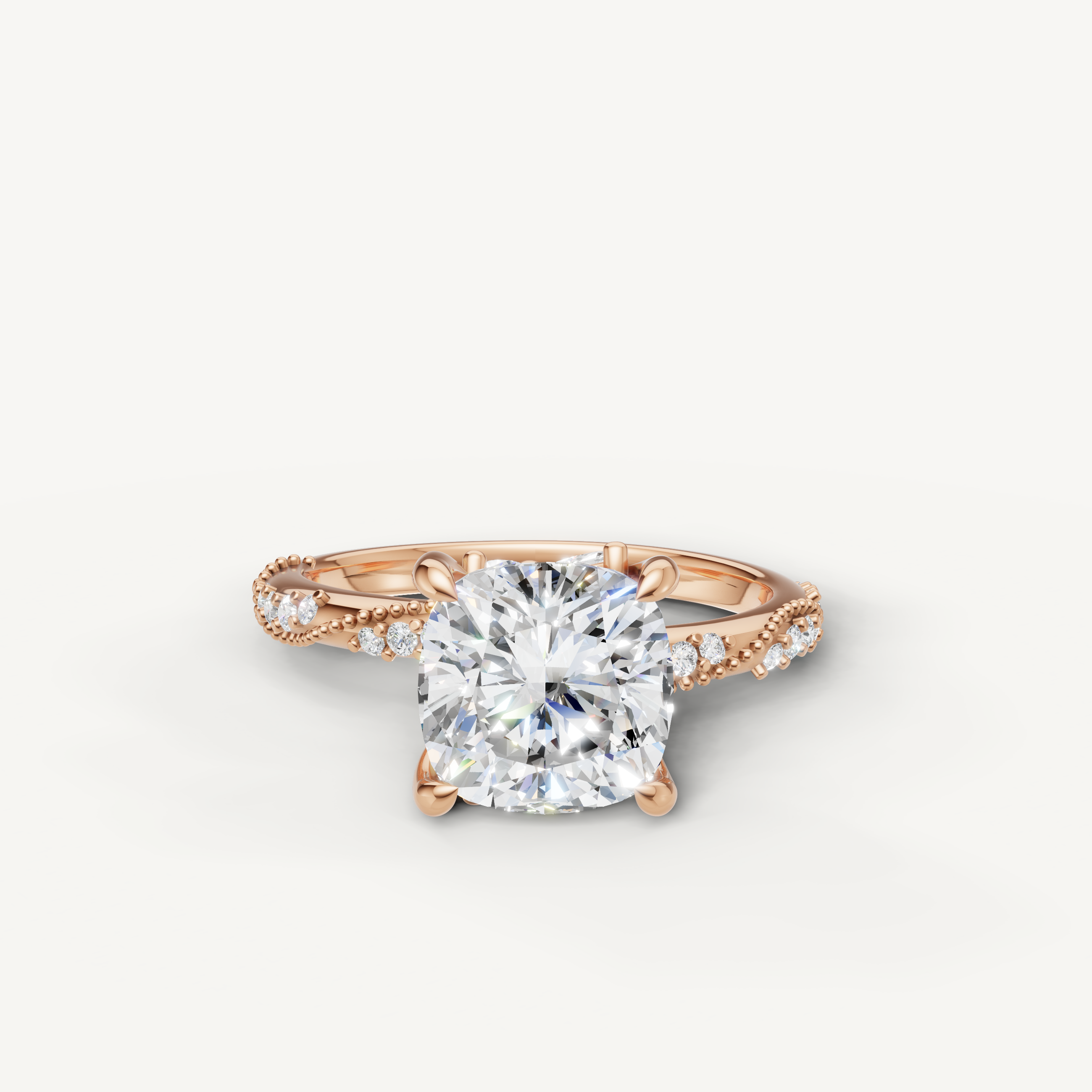 Raul Diamonds cushion cut lab grown diamond engagement ring in 14K rose gold with twisted pavé band
