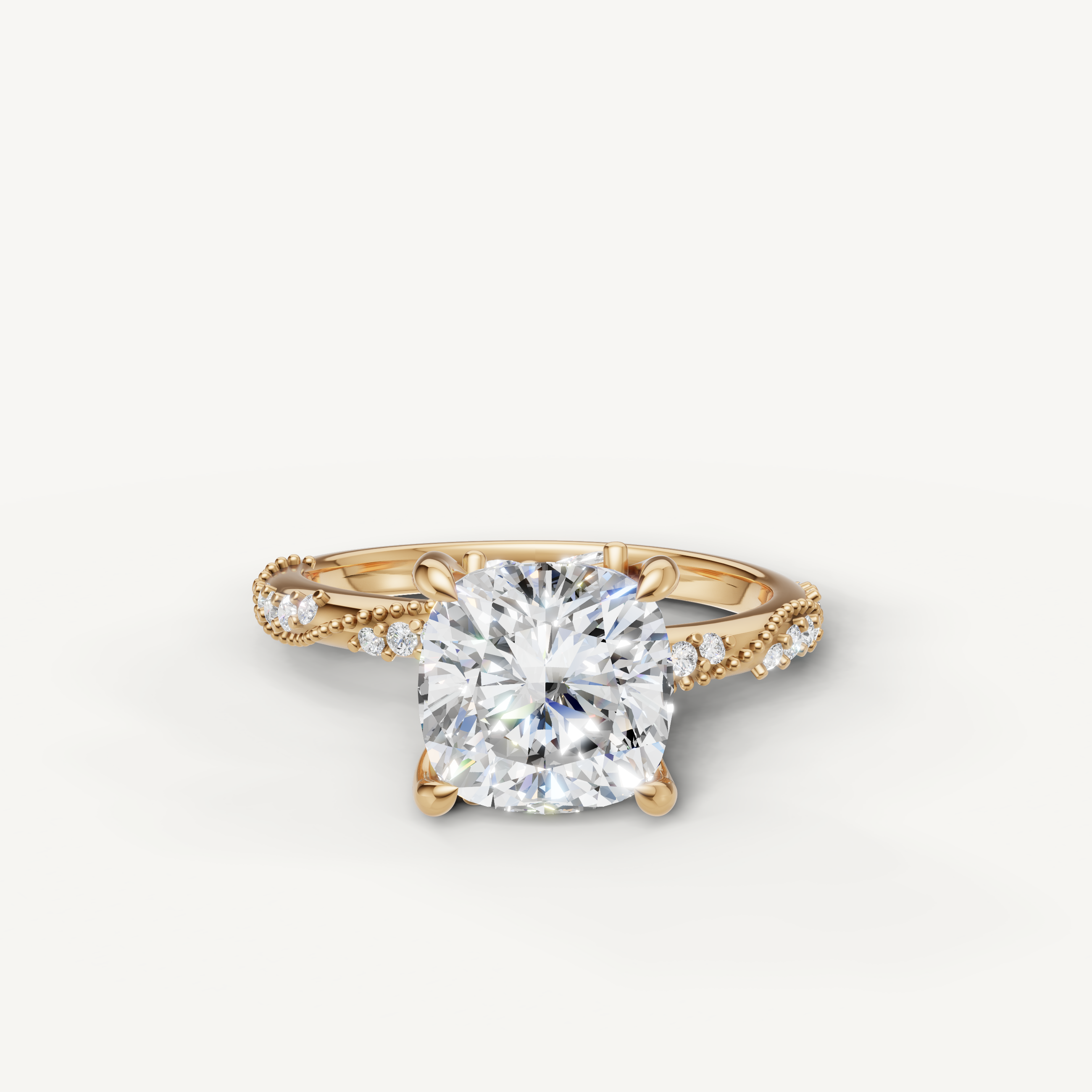 Raul Diamonds cushion cut lab grown diamond engagement ring in 14K yellow gold with twisted pavé band