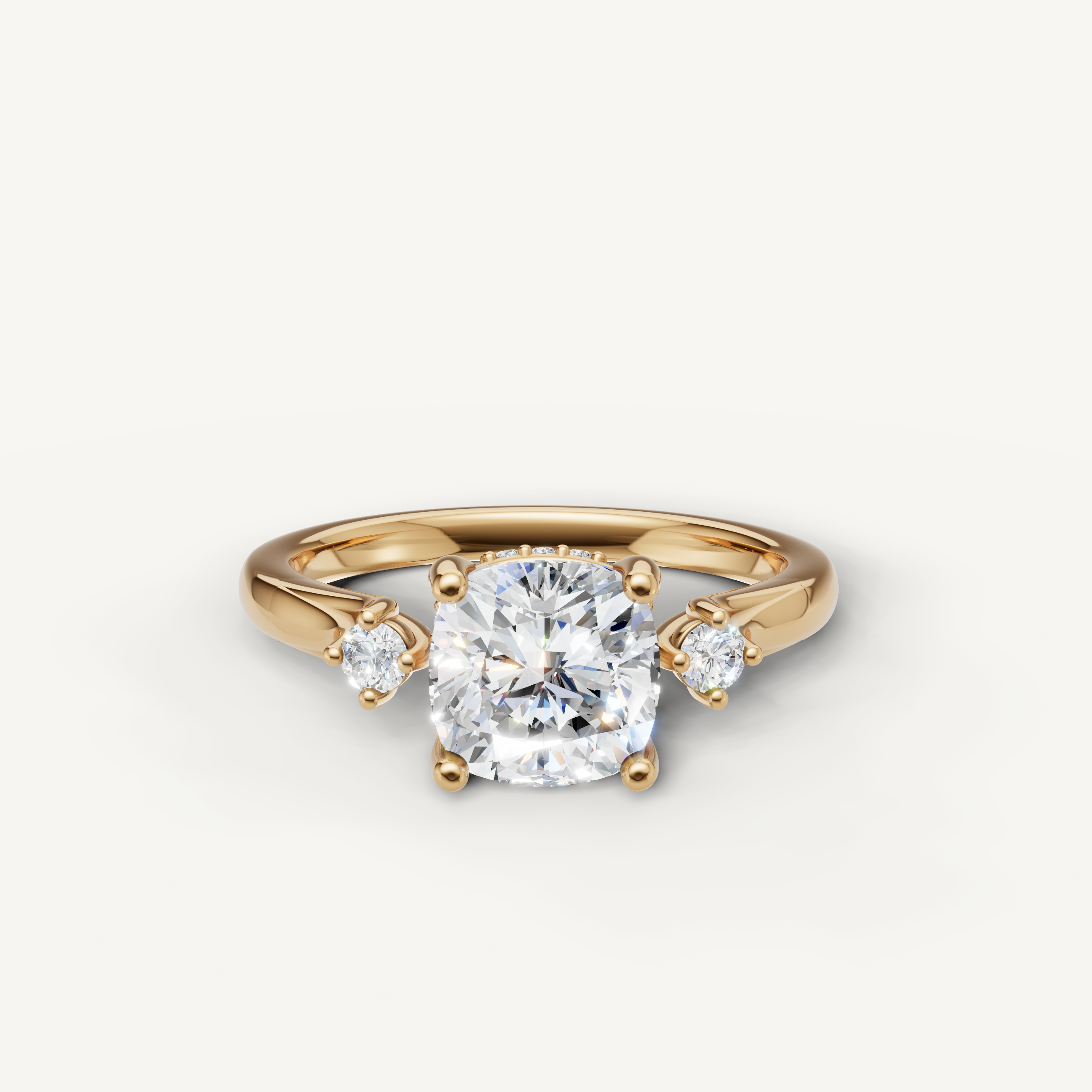 Cushion cut lab grown diamond engagement ring in 14K yellow gold with round side stones by Raul Diamonds