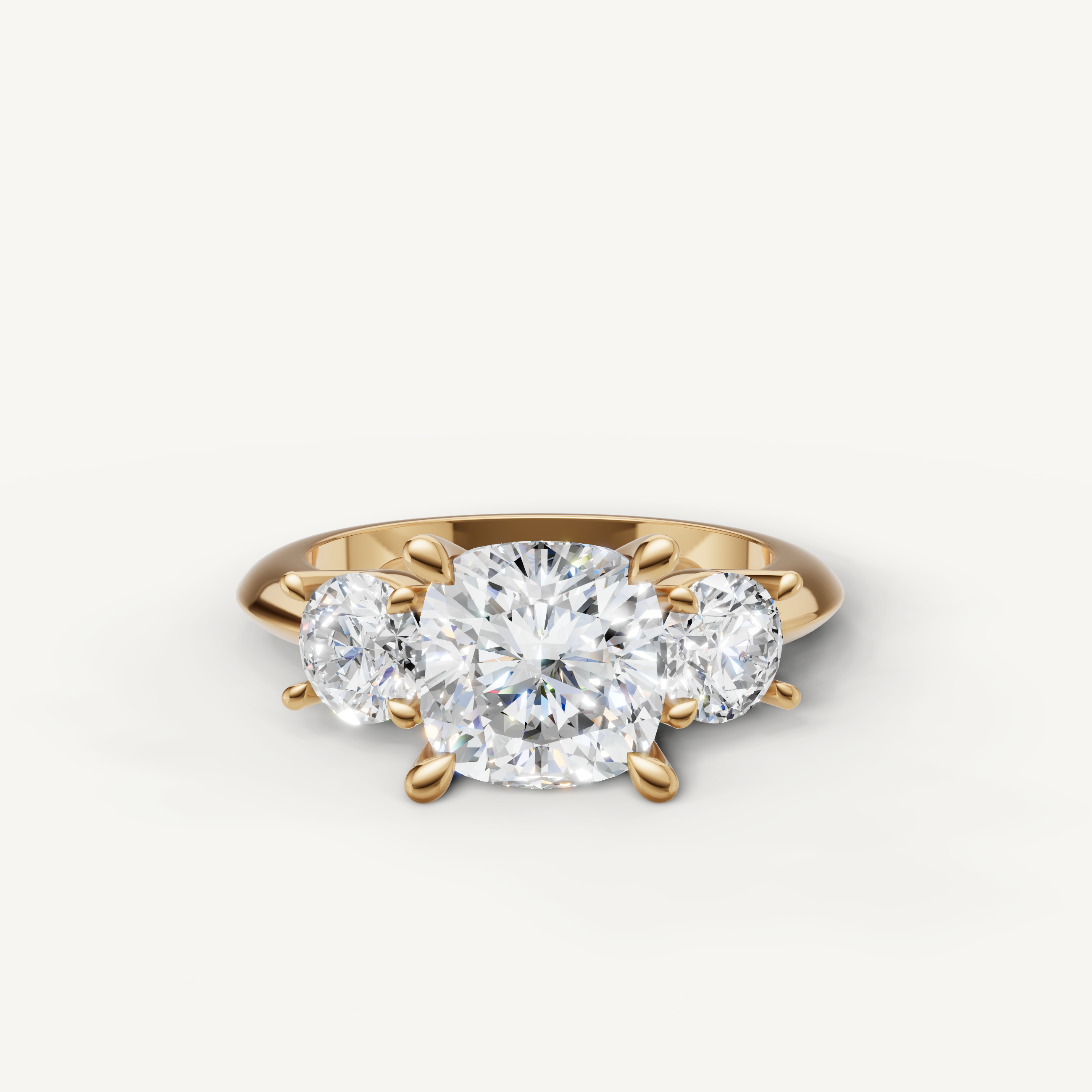 Cushion cut three stone lab grown diamond engagement ring in 14K yellow gold