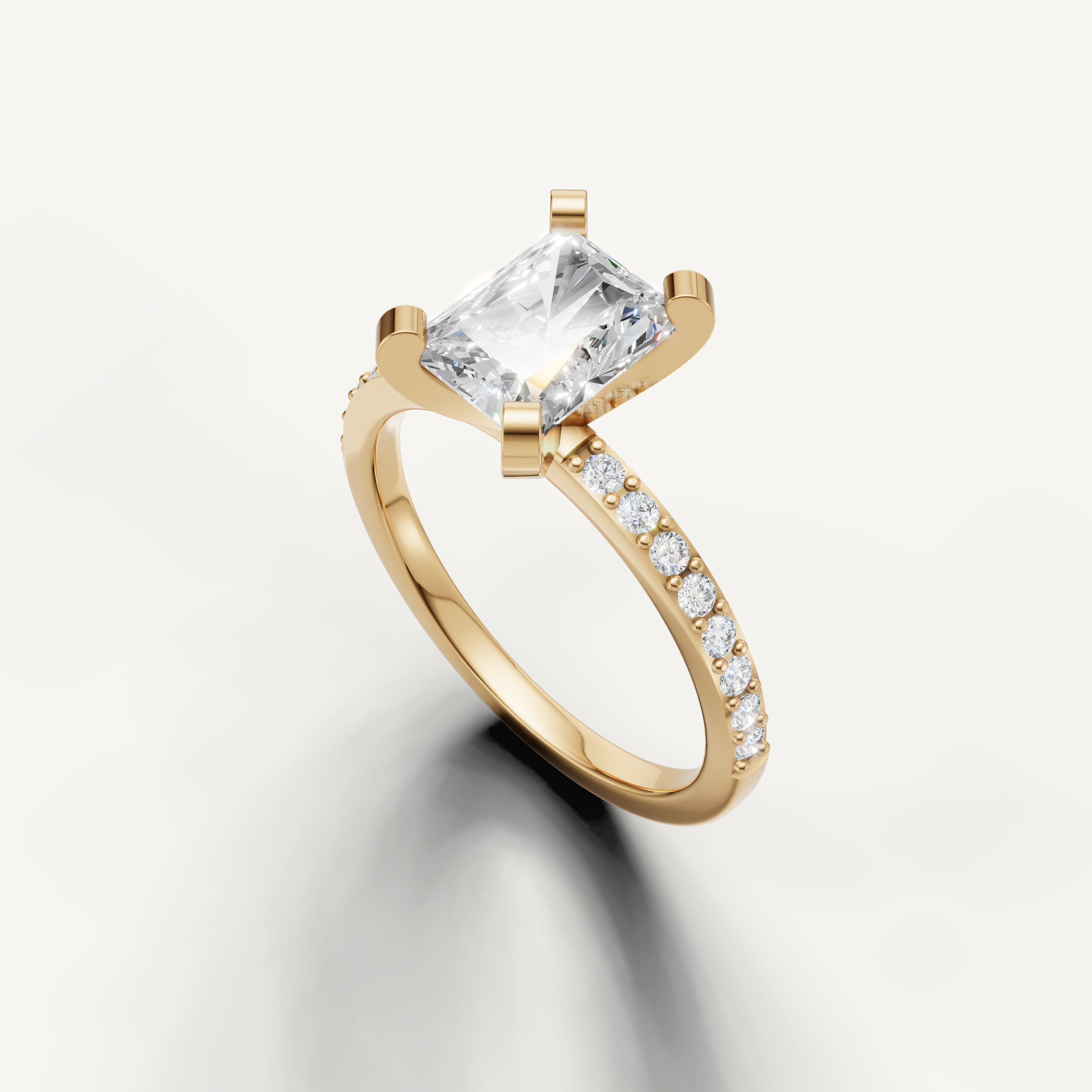 Rectangular radiant cut lab grown diamond ring in yellow gold micro pavé band