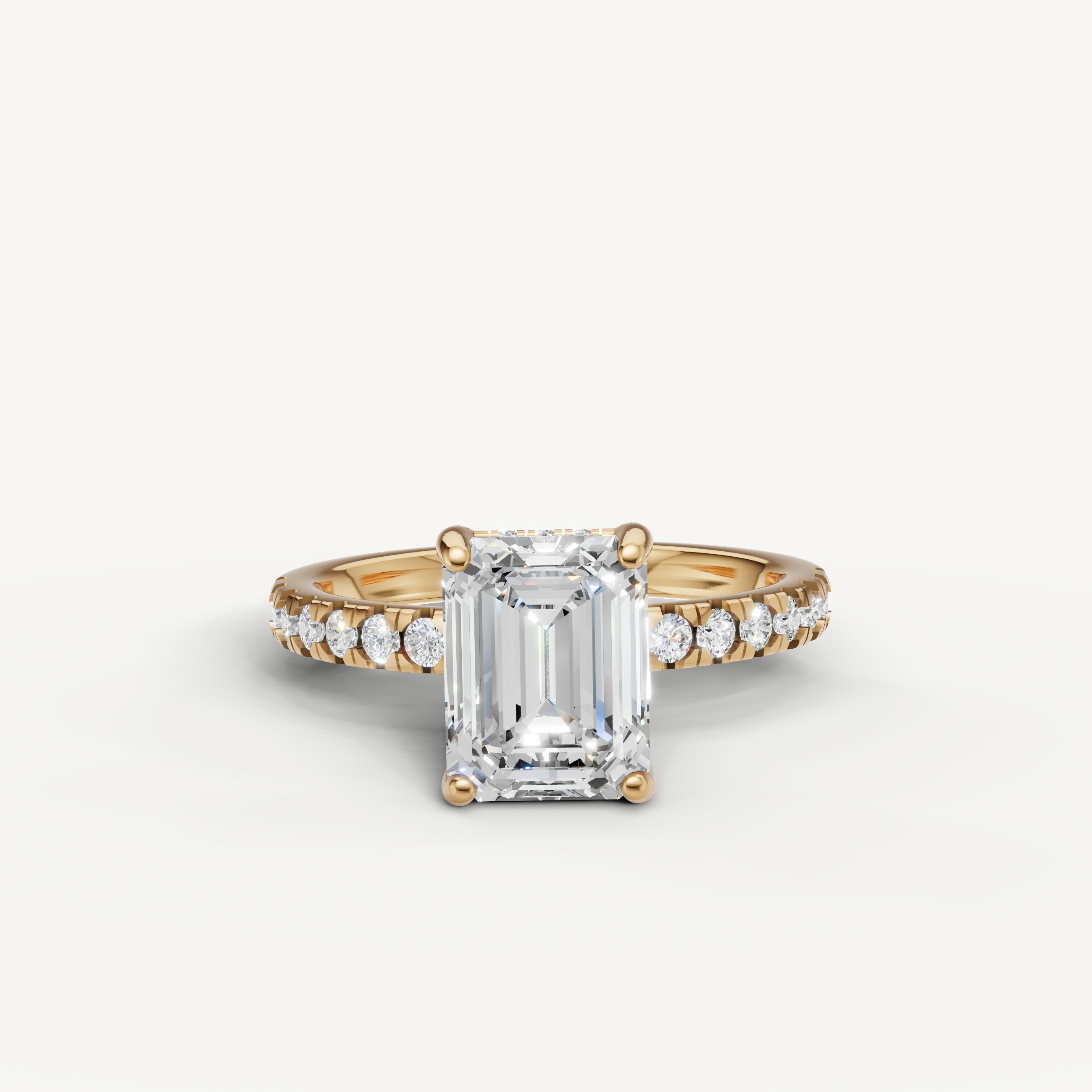 Emerald cut lab grown diamond engagement ring with pavé band yellow gold 4 prong setting