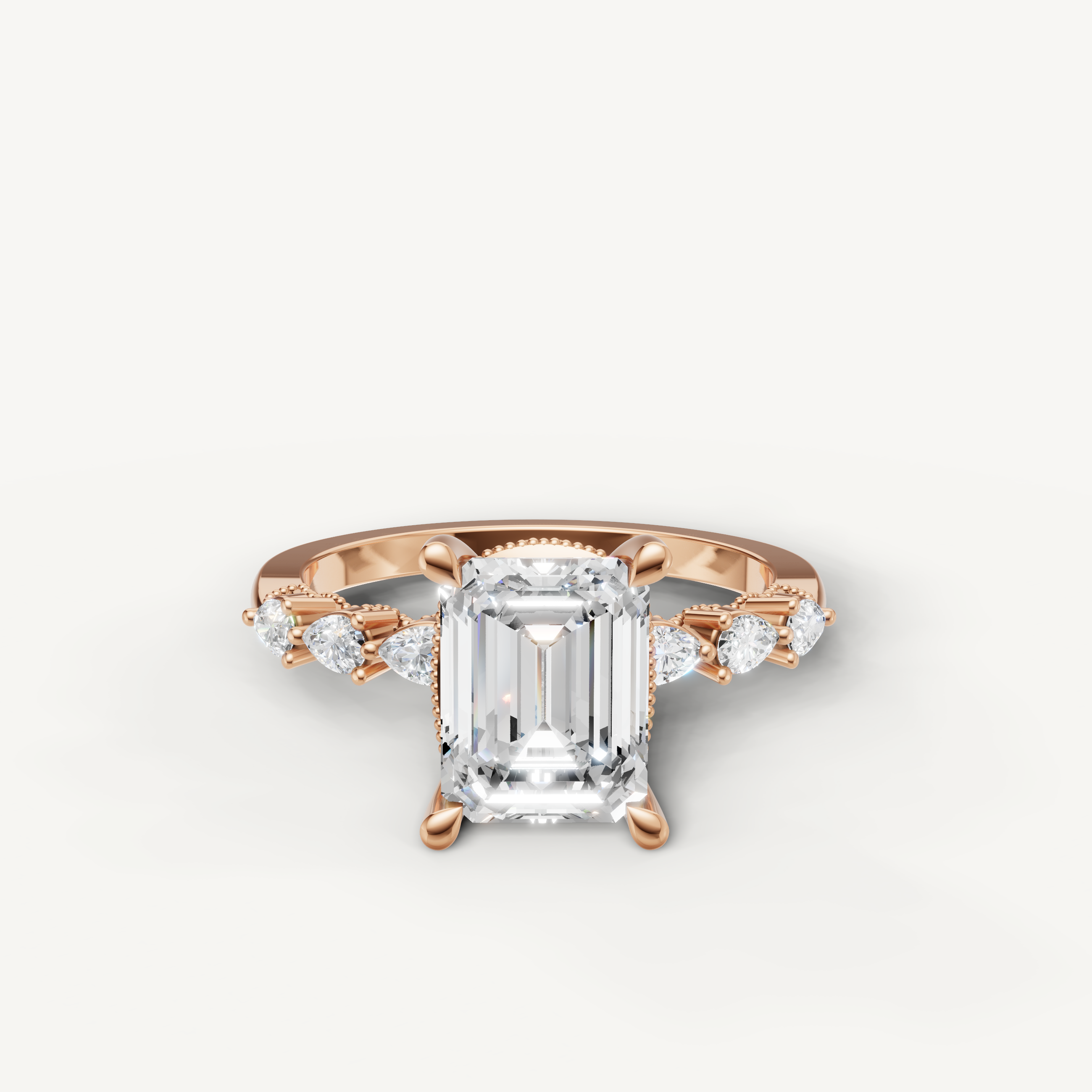 emerald cut lab grown diamond engagement ring with marquise and baguette side stones rose gold
