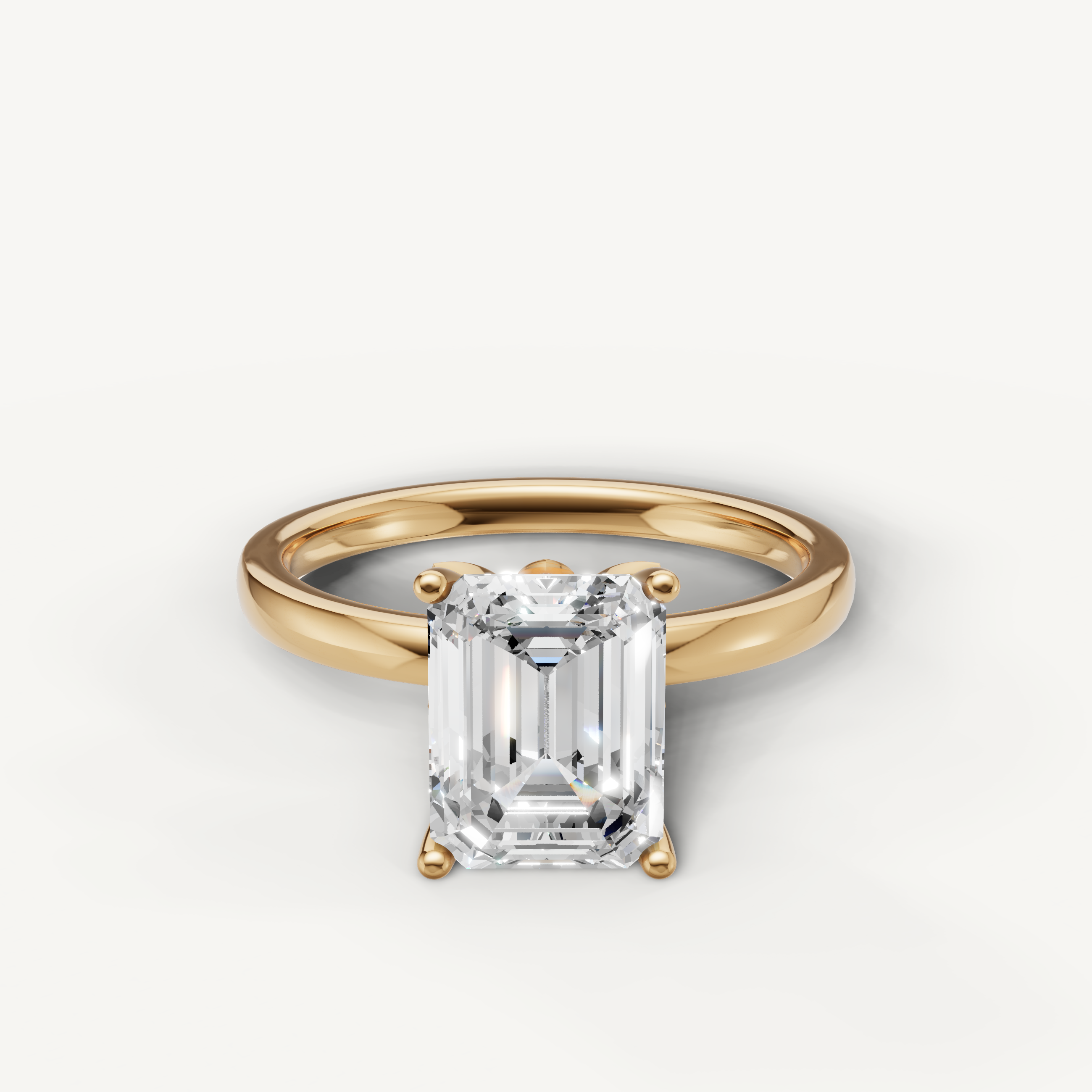 Emerald cut lab grown diamond solitaire engagement ring in yellow gold minimalist 4 prong setting