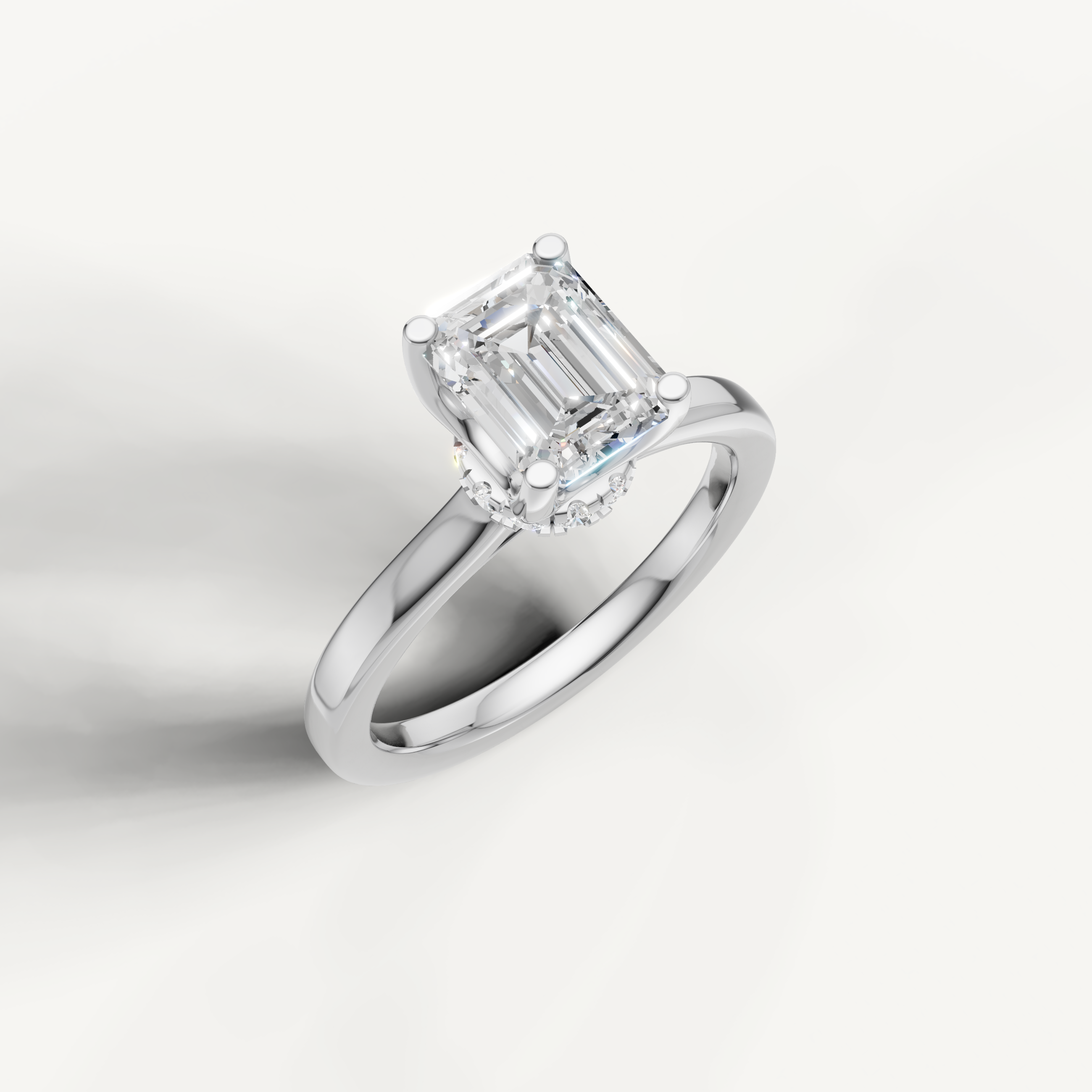sleek emerald cut lab grown diamond ring in 14k white gold with classic four-prong setting