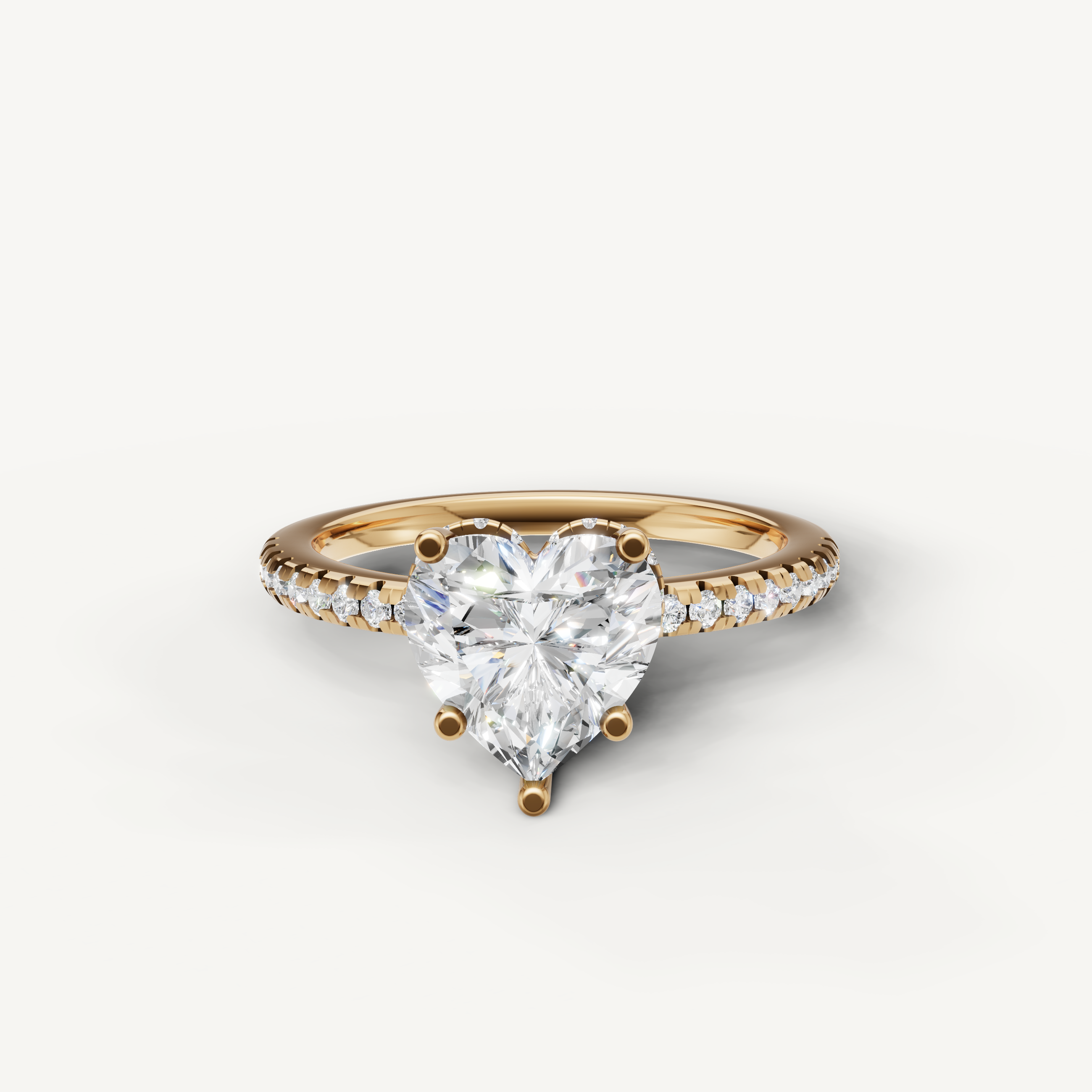 heart shaped lab grown diamond engagement ring with pavé band in 14k yellow gold