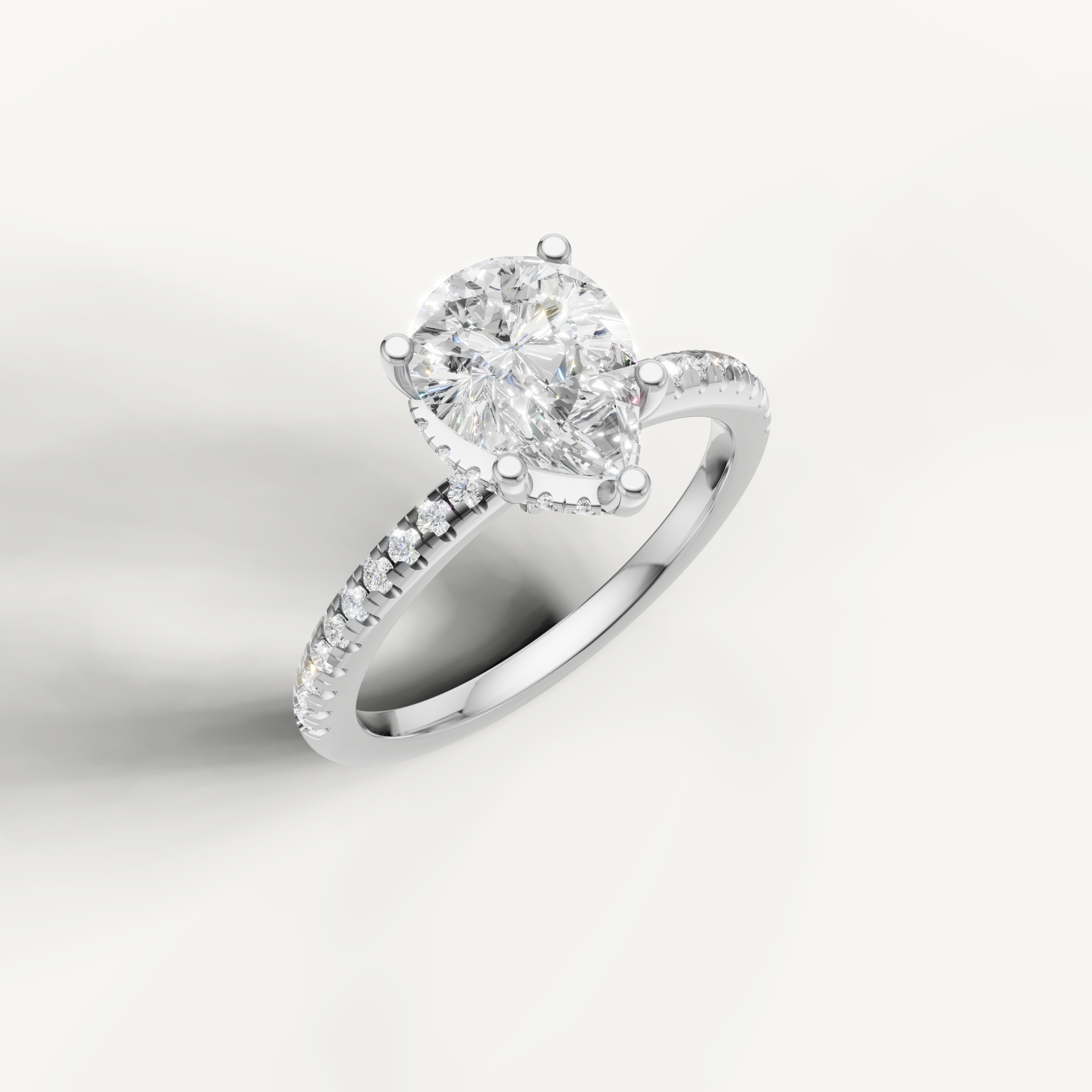 IGI certified pear shaped lab diamond solitaire ring with delicate pavé shank white gold
