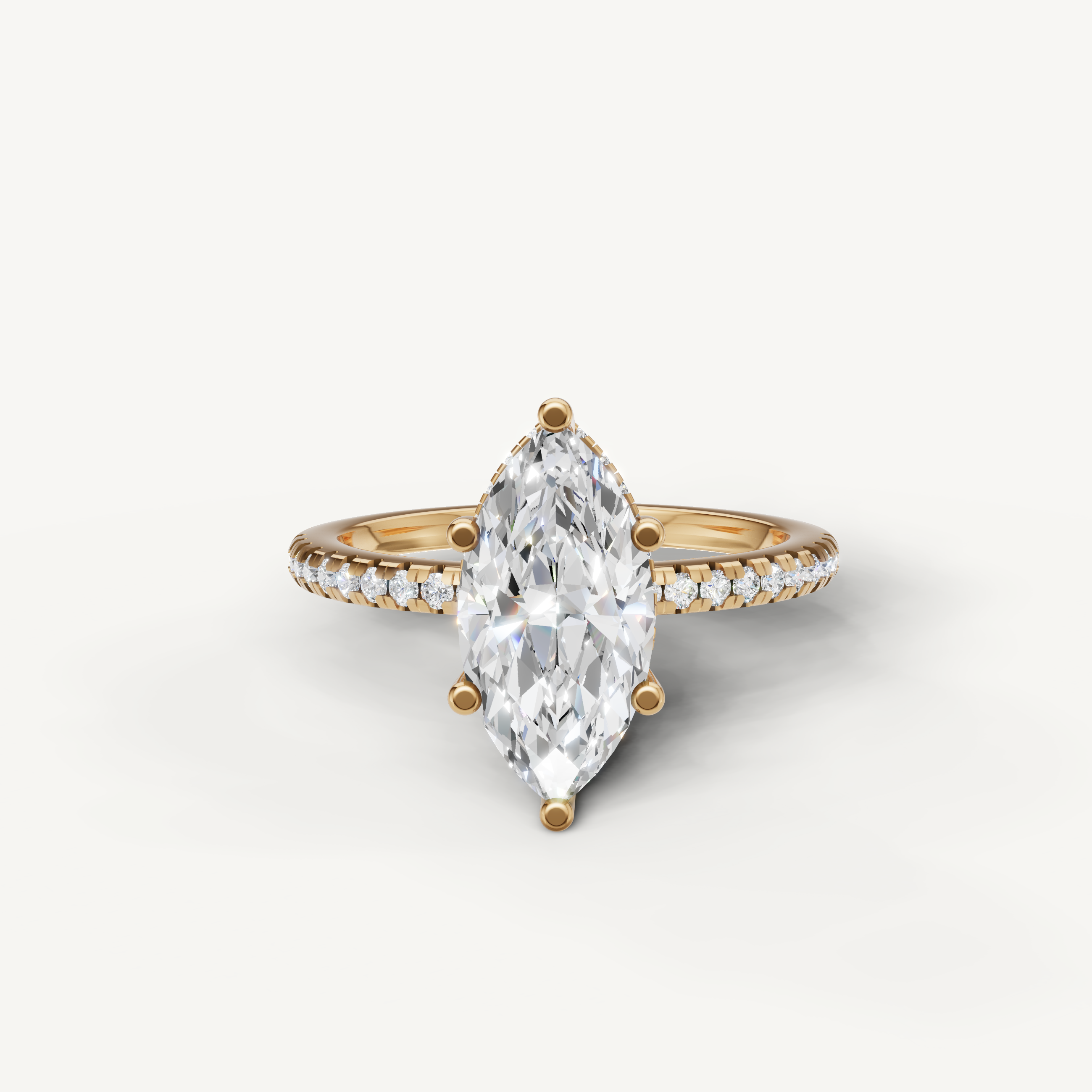 marquise cut lab grown diamond engagement ring with pavé band in 14k yellow gold