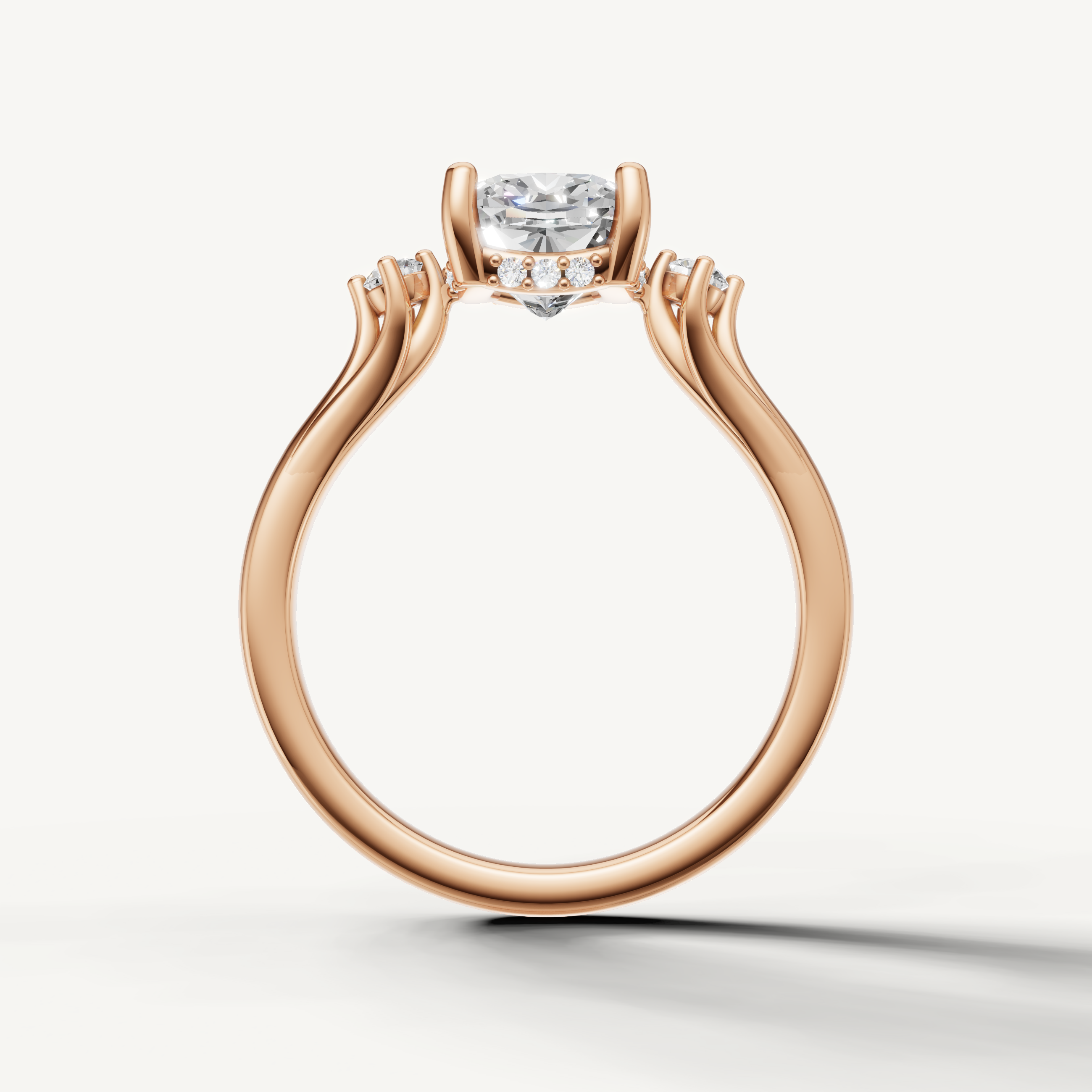 Modern cushion cut lab grown diamond ring in rose gold with classic four prong setting