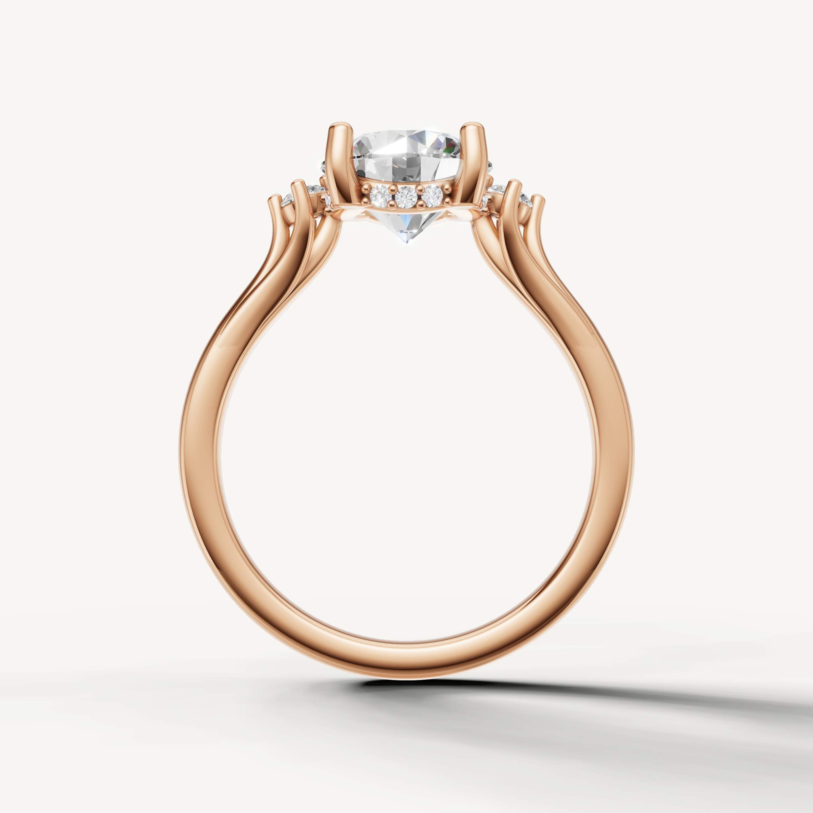 Modern round cut lab grown diamond ring in rose gold with elegant side stone accents