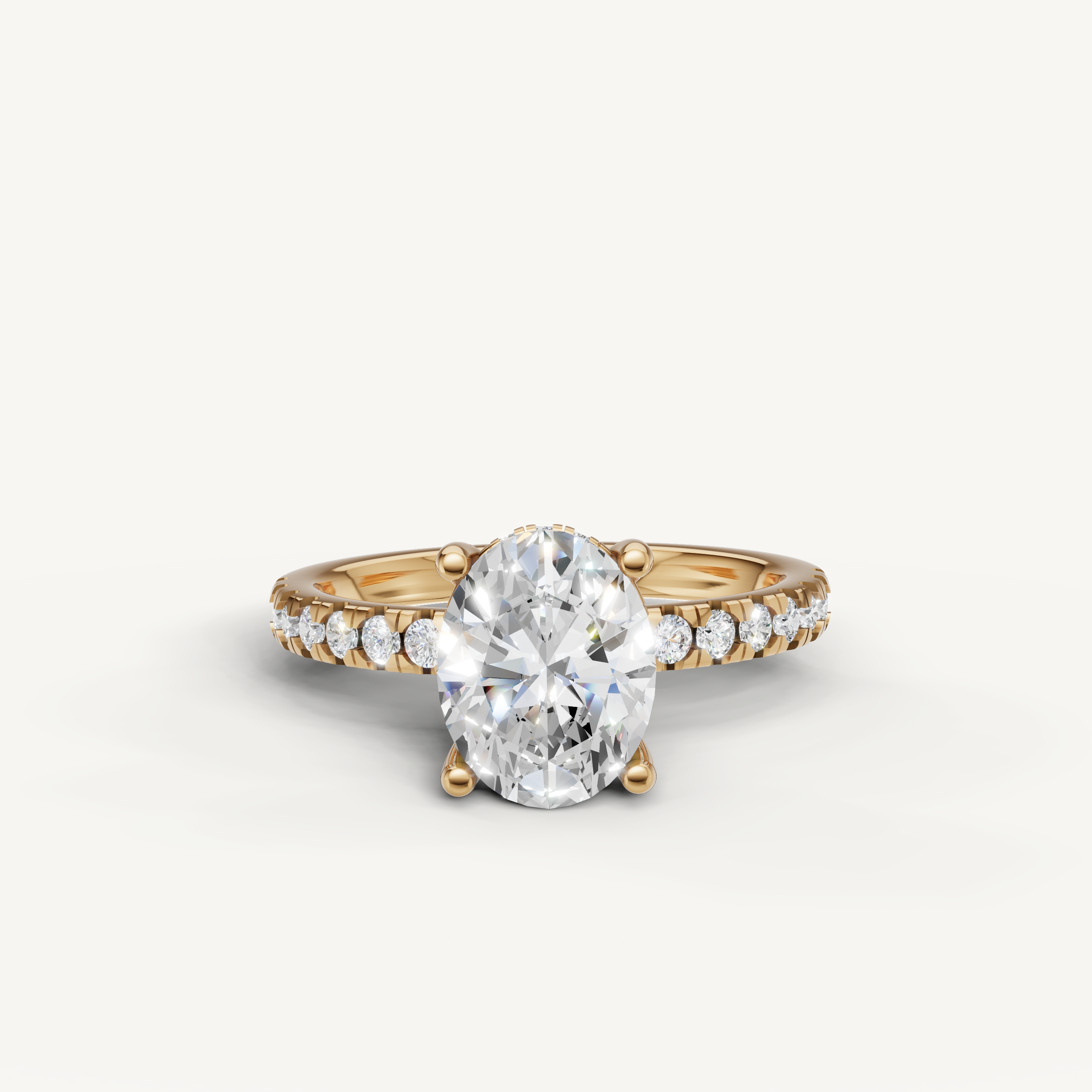 oval cut lab grown diamond engagement ring with pavé band yellow gold