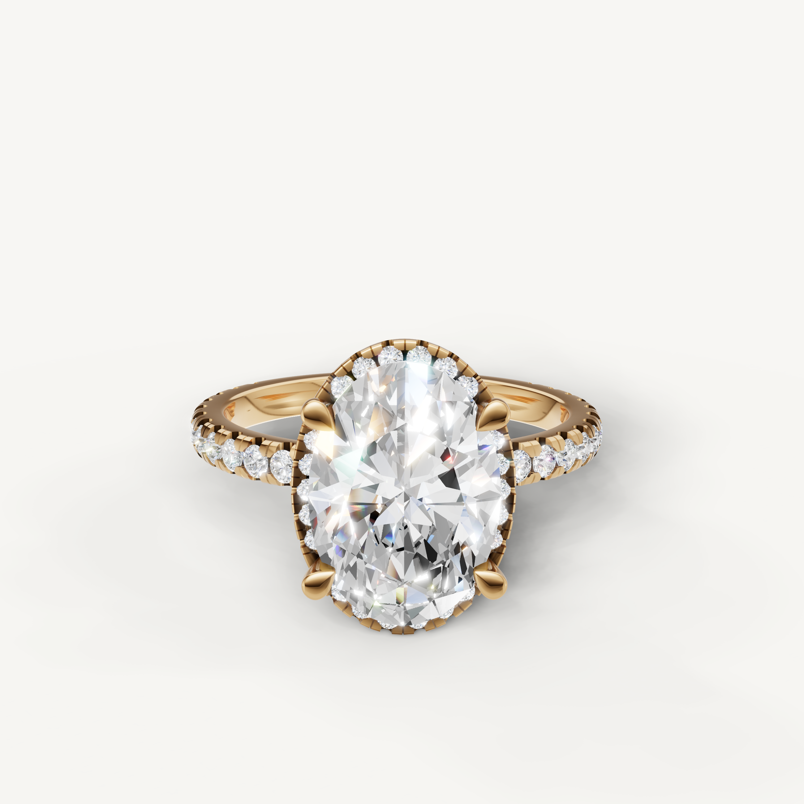Oval cut lab grown diamond engagement ring with hidden halo pavé band yellow gold