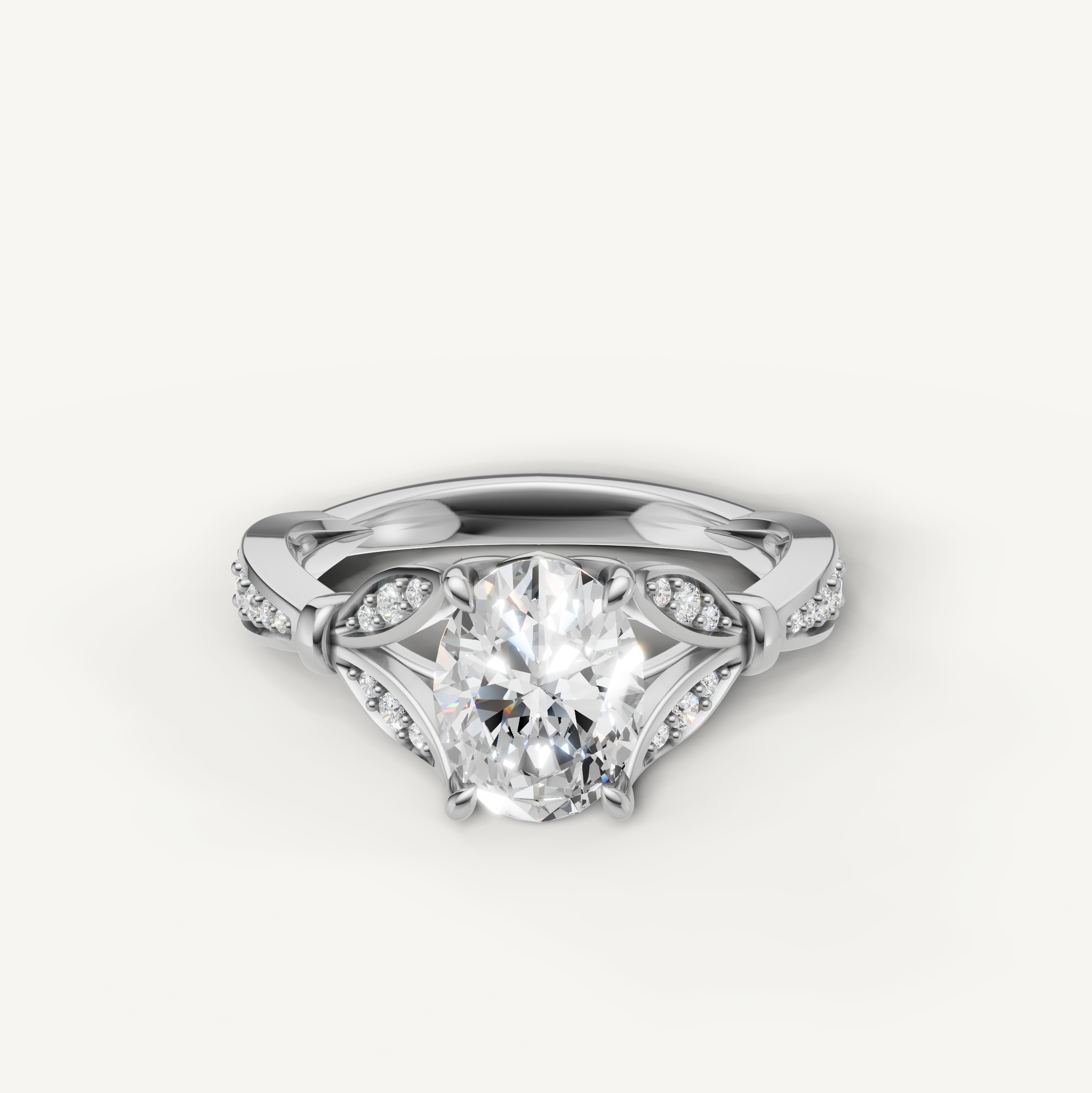 Oval cut lab grown diamond engagement ring in 14K white gold with intricate pavé detailing by Raul Diamonds