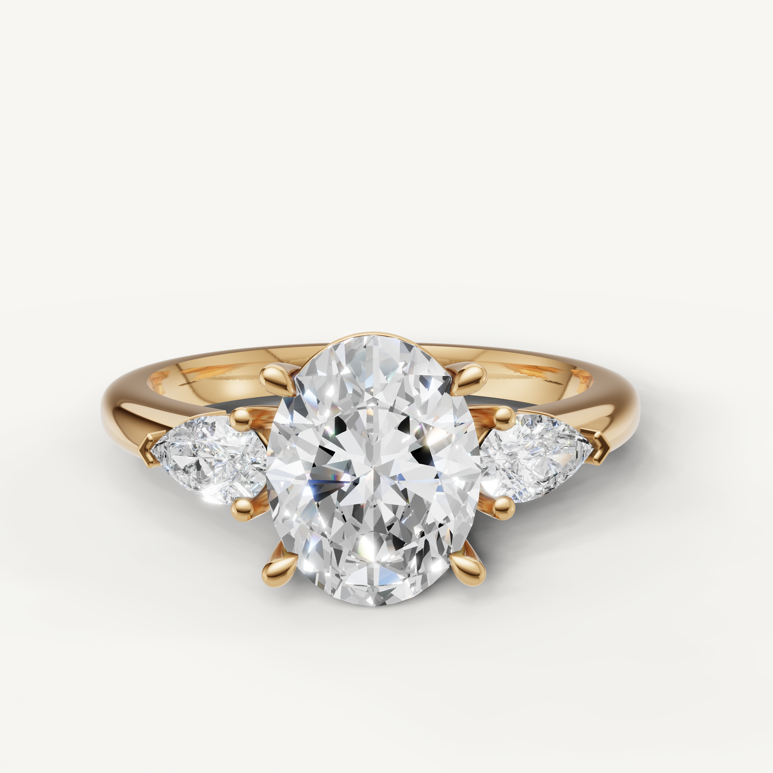 oval lab grown diamond engagement ring with marquise side stones in 14k yellow gold