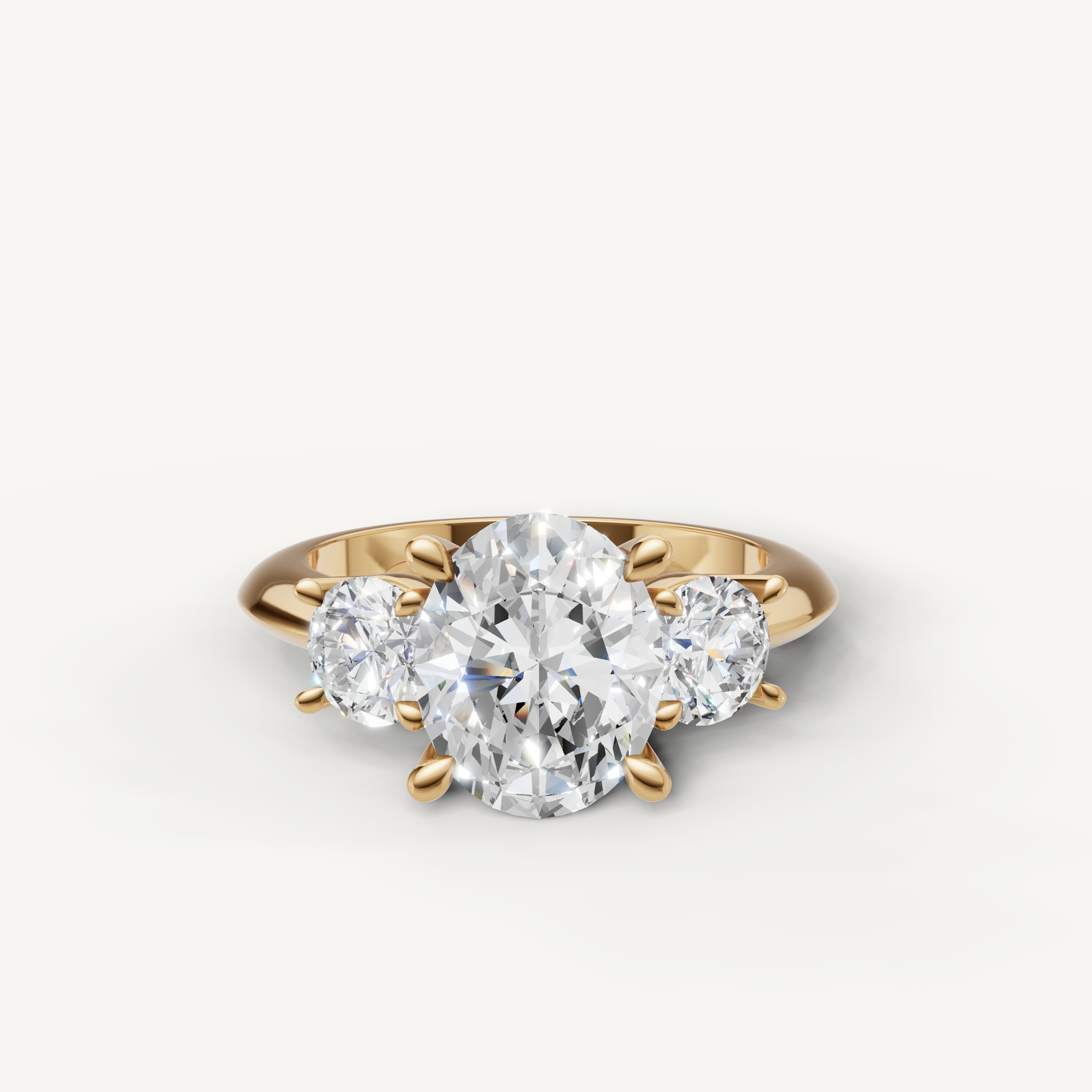 Oval cut three stone lab grown diamond engagement ring in 14K yellow gold