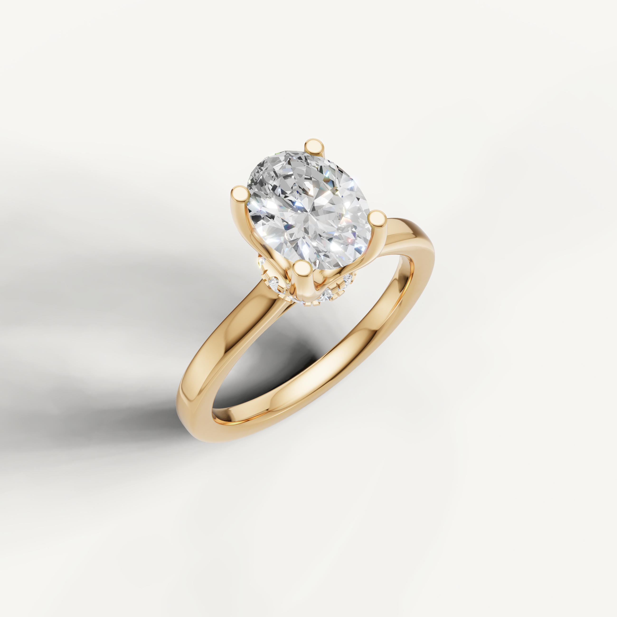elegant oval lab grown diamond engagement ring with polished yellow gold solitaire band