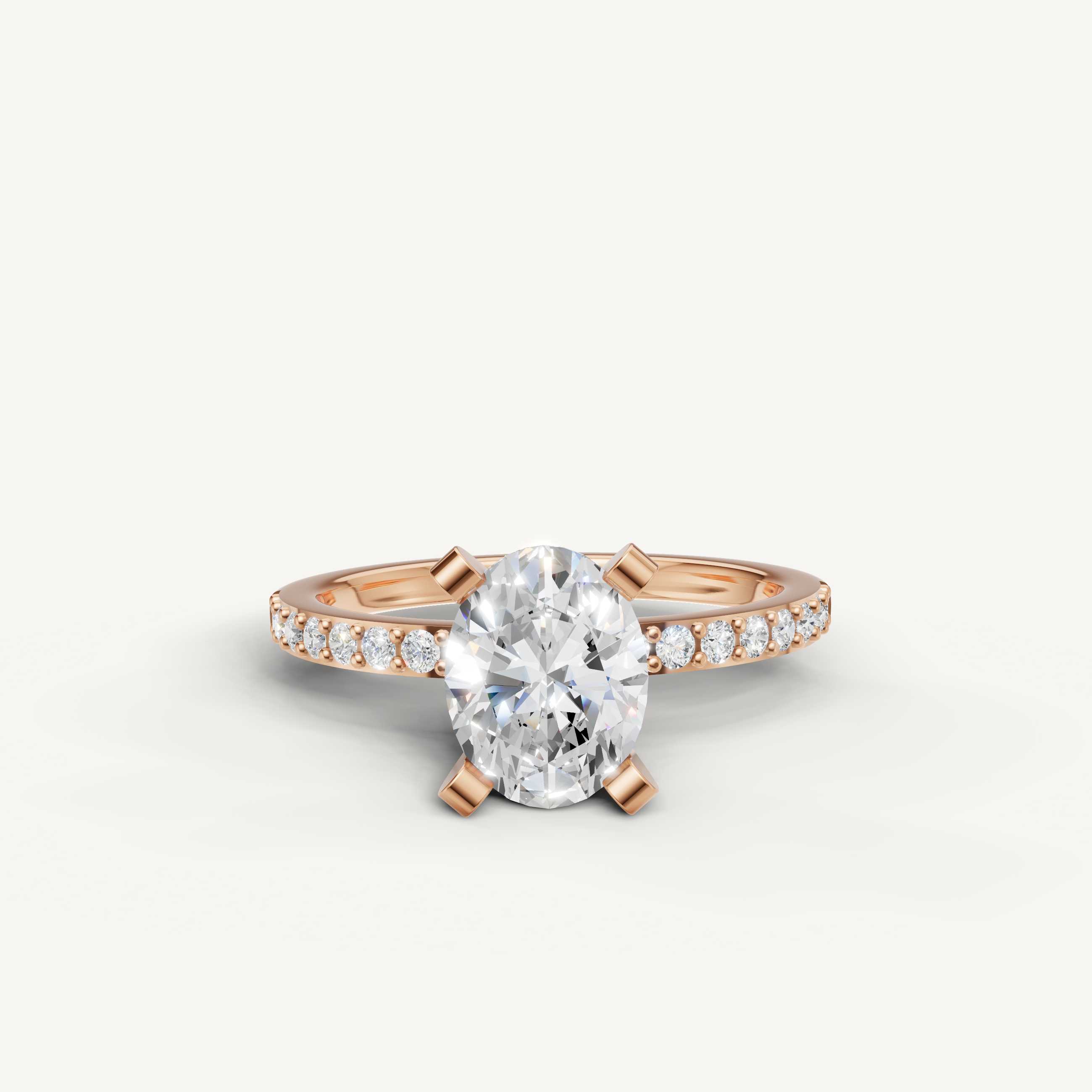 Oval cut lab grown diamond engagement ring in 14K rose gold with pavé band