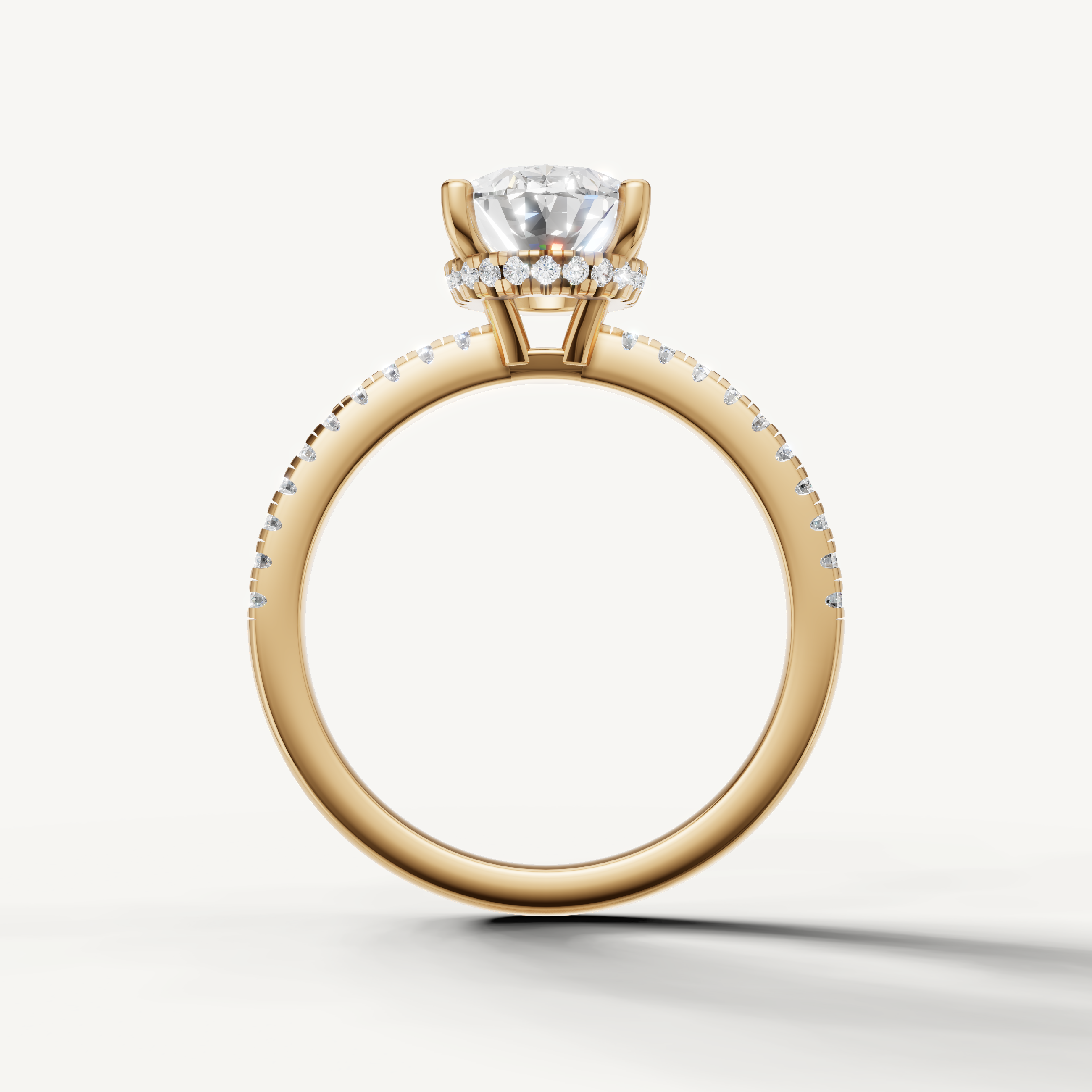 finger flattering oval lab grown diamond ring with sparkling pavé band yellow gold