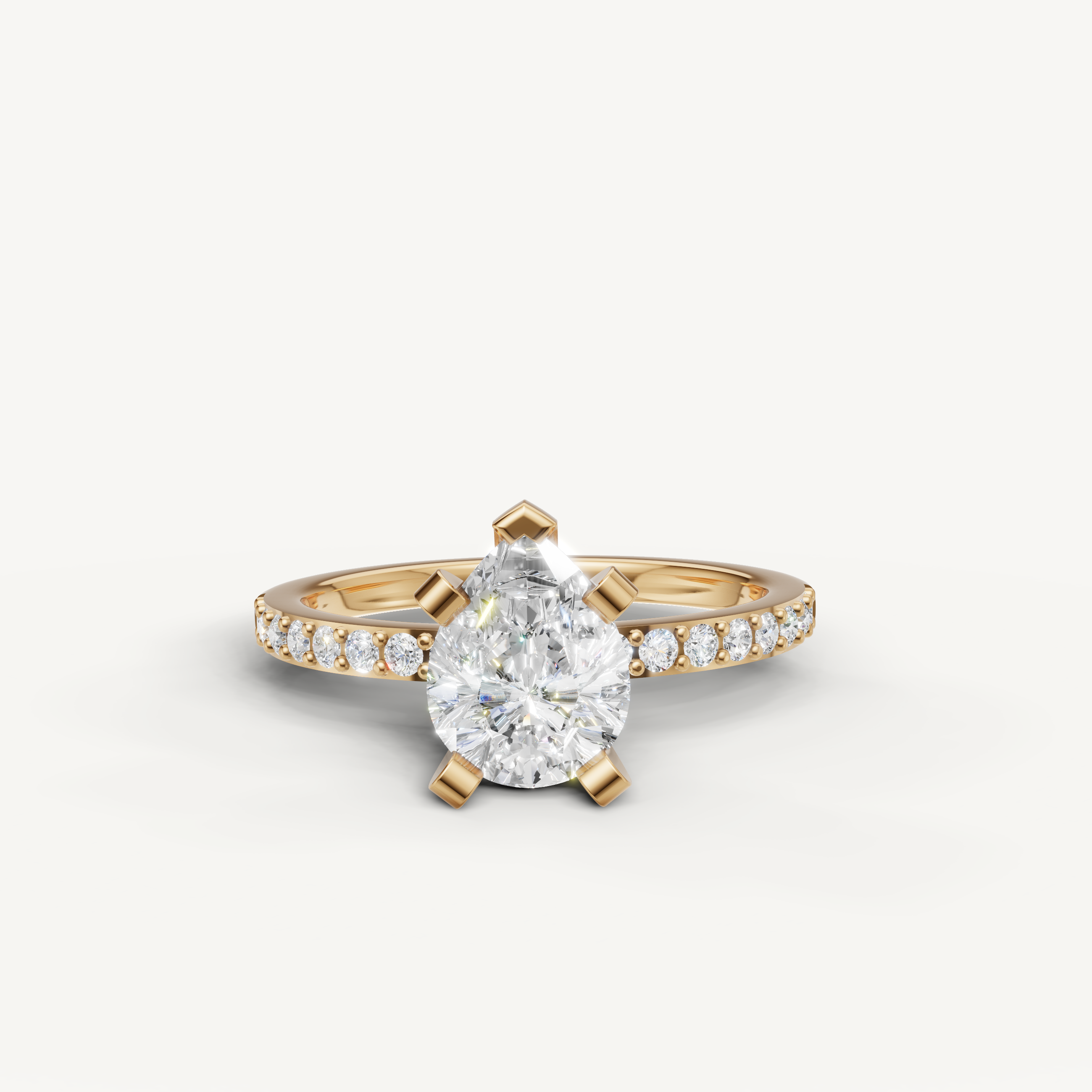 Pear cut lab grown diamond engagement ring in 14K yellow gold with pavé band